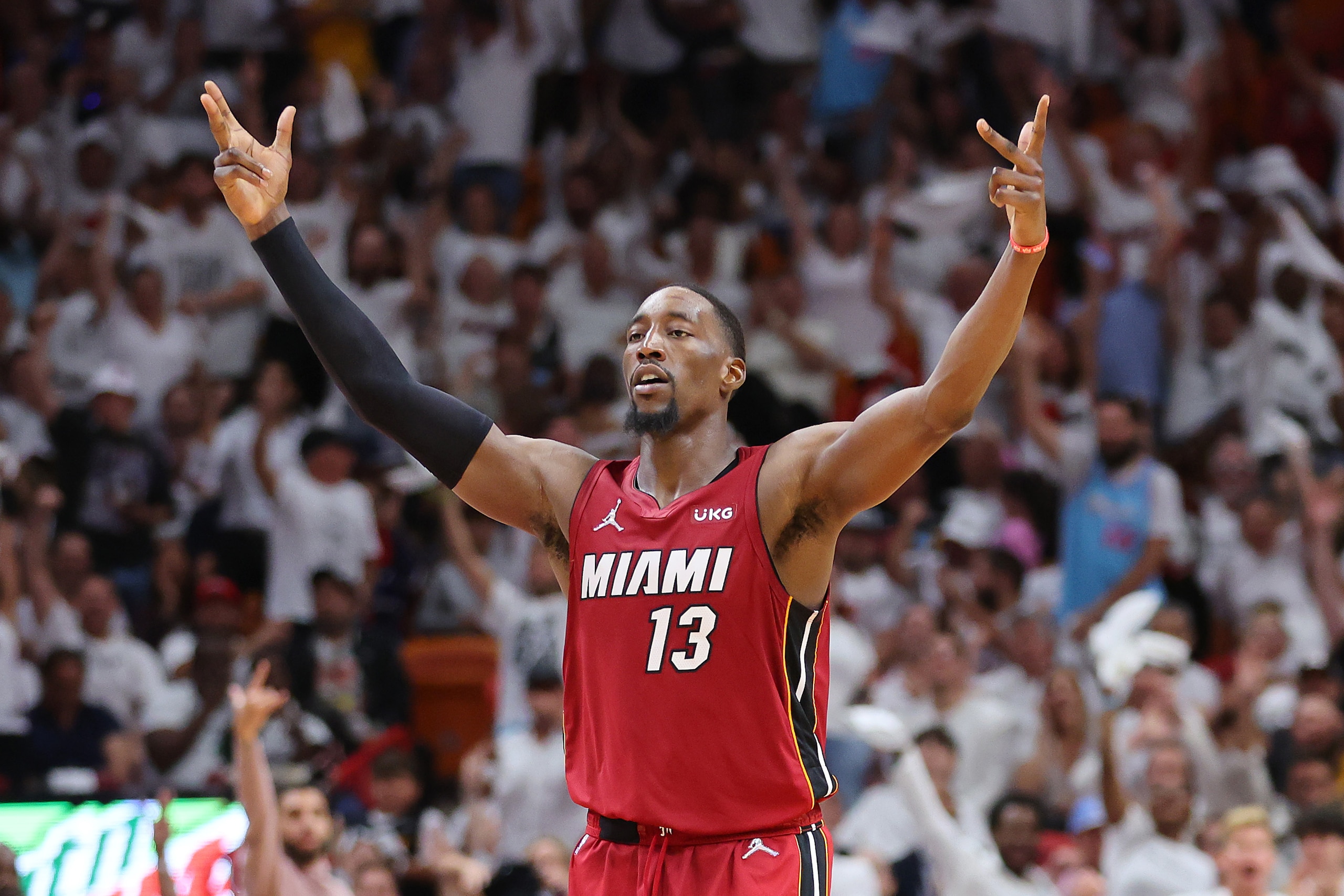 MIAMI, FLORIDA - APRIL 26: Bam Adebayo #13 of the Miami Heat celebrates a three pointer against the Atlanta Hawks during the second half in Game Five of the Eastern Conference First Round at FTX Arena on April 26, 2022 in Miami, Florida. NOTE TO USER: User expressly acknowledges and agrees that, by downloading and or using this photograph, User is consenting to the terms and conditions of the Getty Images License Agreement.  (Photo by Michael Reaves/Getty Images)