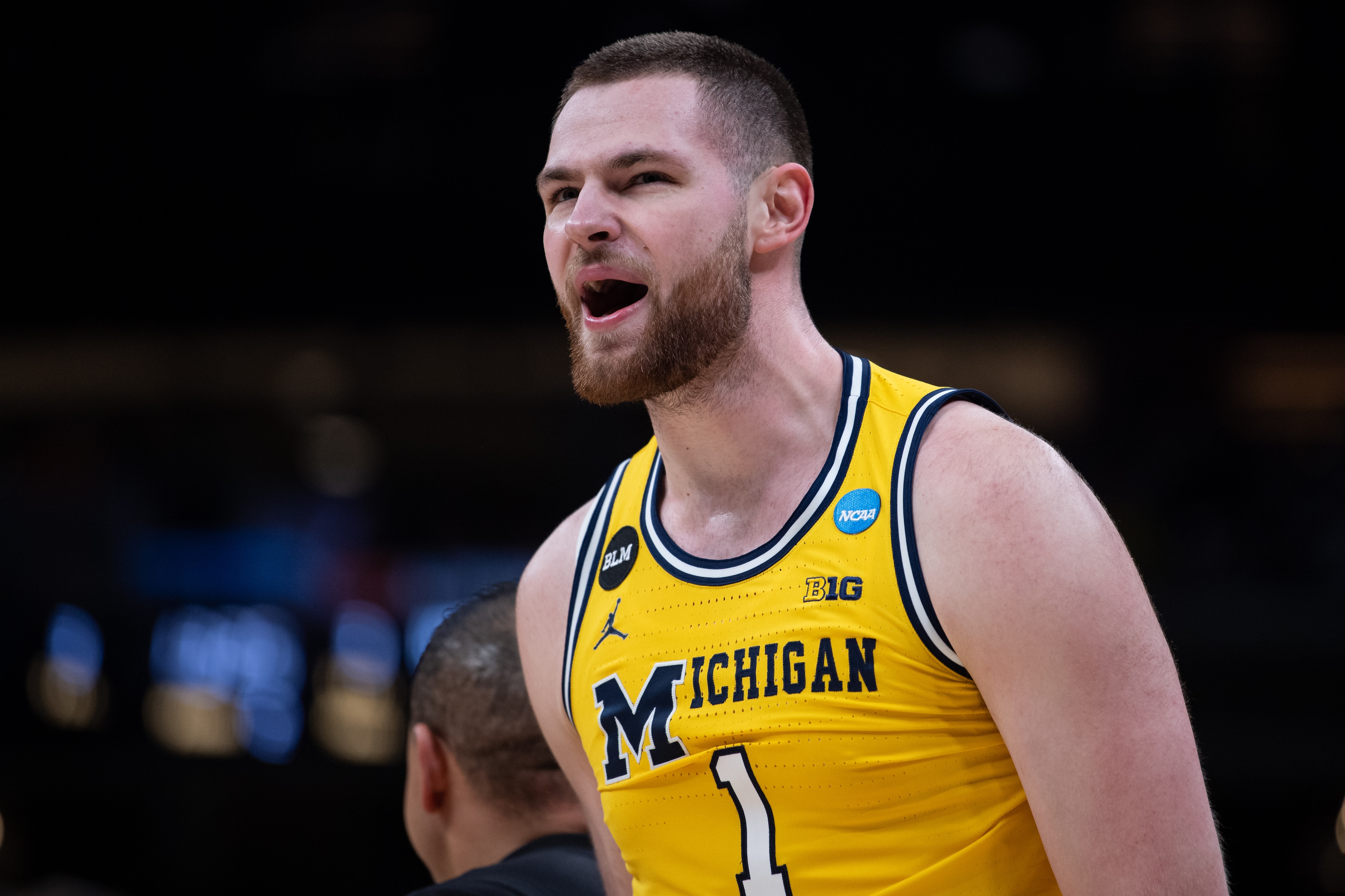 INDIANAPOLIS, IN - MARCH 19: Michigan Wolverines center Hunter Dickinson (1) celebrates on the court during the NCAA Division I Mens Basketball Championship Round 2 game between the Michigan Wolverines and Tennessee Volunteers on March 19, 2022, at Gainbridge Fieldhouse in Indianapolis, IN. (Photo by Zach Bolinger/Icon Sportswire via Getty Images)