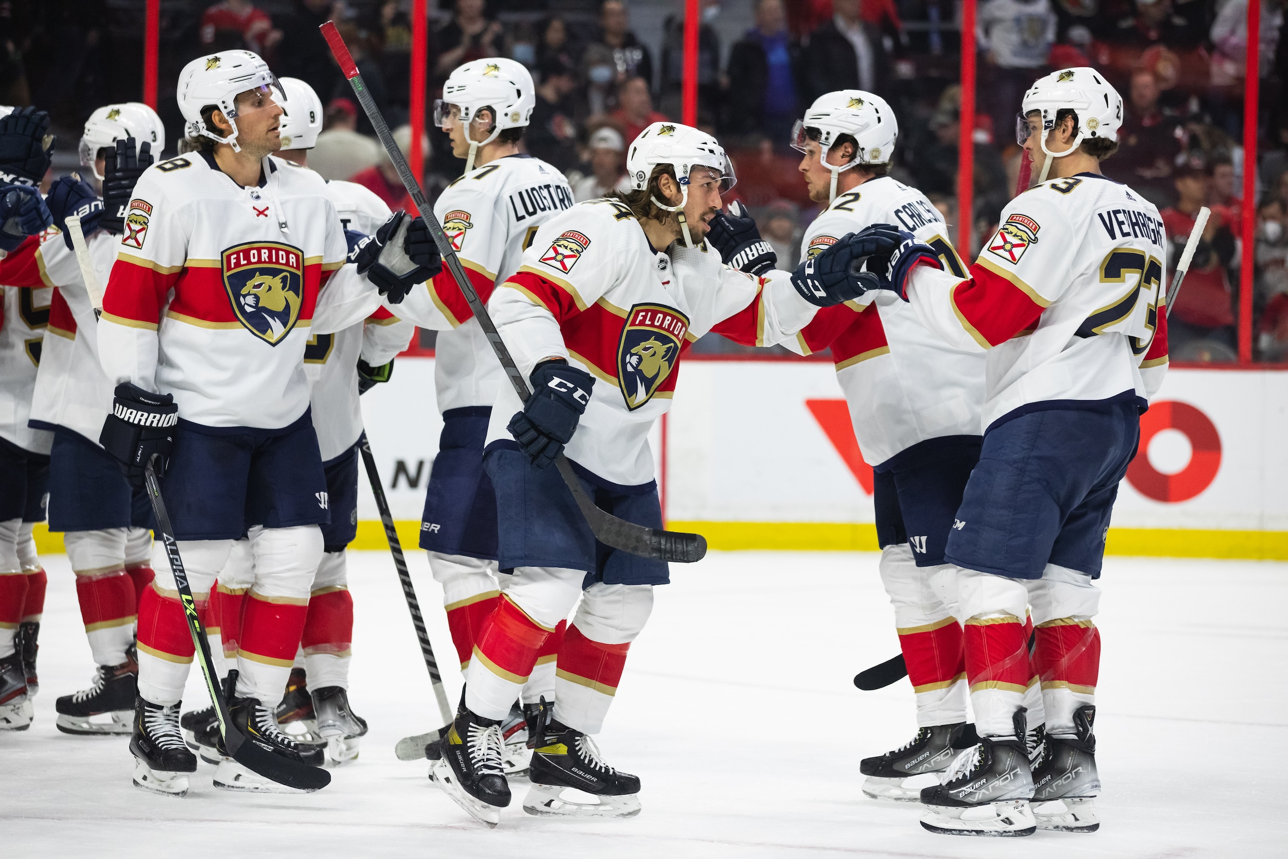OTTAWA, ON - APRIL 28: Florida Panthers Left Wing Ryan Lomberg (94) celebrates the win with Carter Verhaeghe (23) after National Hockey League action between the Florida Panthers and Ottawa Senators on April 28, 2022, at Canadian Tire Centre in Ottawa, ON, Canada. (Photo by Richard A. Whittaker/Icon Sportswire via Getty Images)