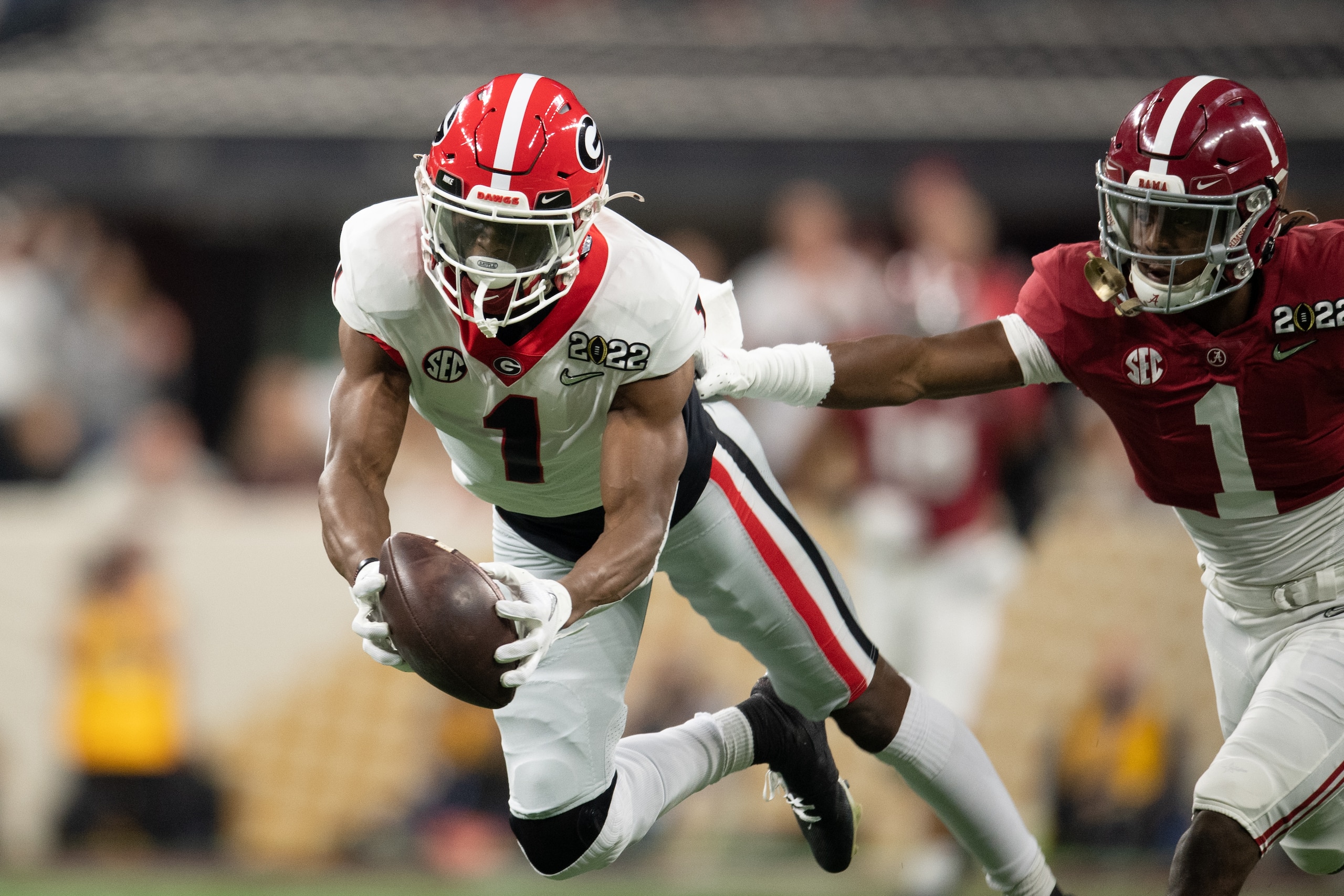 INDIANAPOLIS, IN - JANUARY 10: Georgia Bulldogs WR George Pickens (1) catches a deep pass defended by Alabama Crimson Tide DB Kool-Aid McKinstry (1) during the Alabama Crimson Tide versus the Georgia Bulldogs in the College Football Playoff National Championship, on January 10, 2022, at Lucas Oil Stadium in Indianapolis, IN. (Photo by Zach Bolinger/Icon Sportswire via Getty Images)
