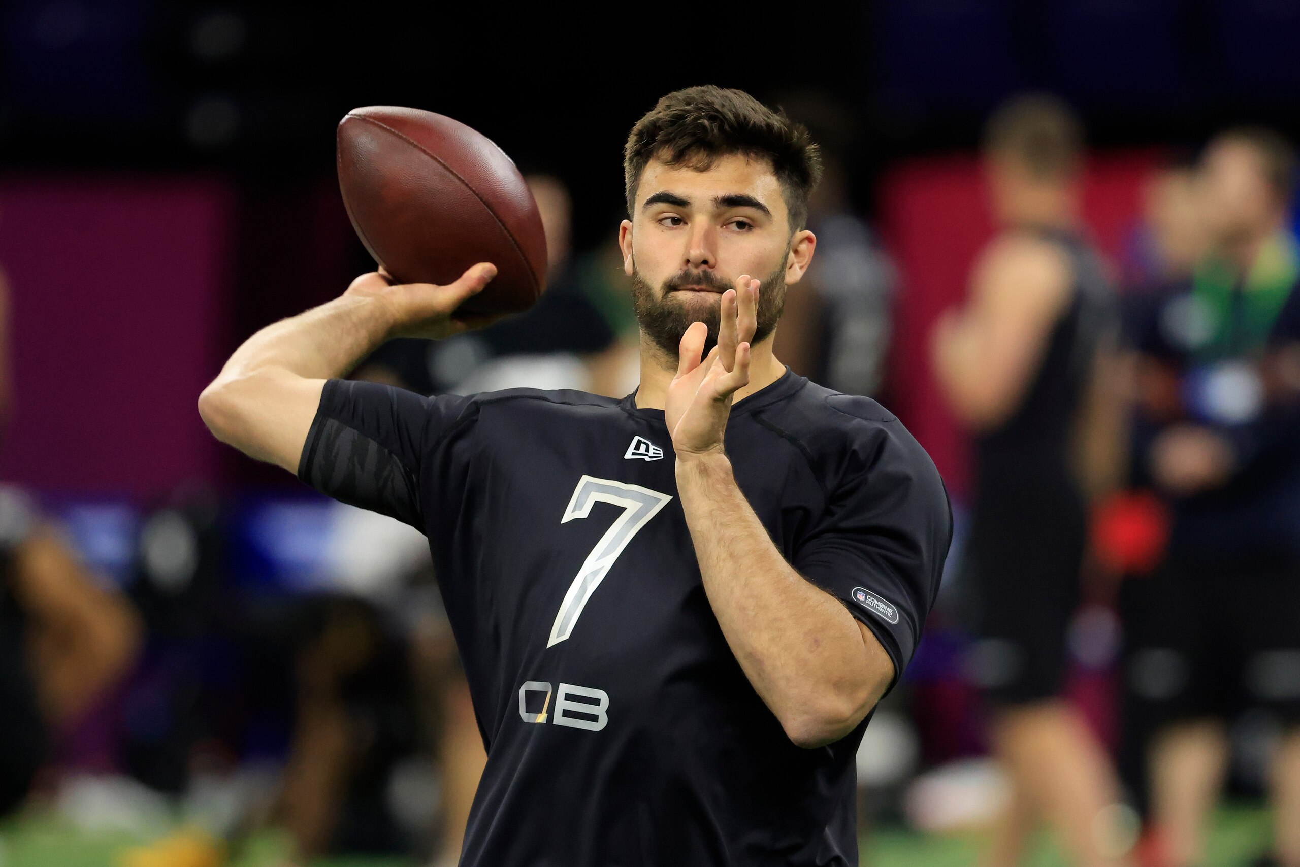 INDIANAPOLIS, INDIANA - MARCH 03: Sam Howell #QB07 of the North Carolina Tar Heels throws during the NFL Combine at Lucas Oil Stadium on March 03, 2022 in Indianapolis, Indiana. (Photo by Justin Casterline/Getty Images)