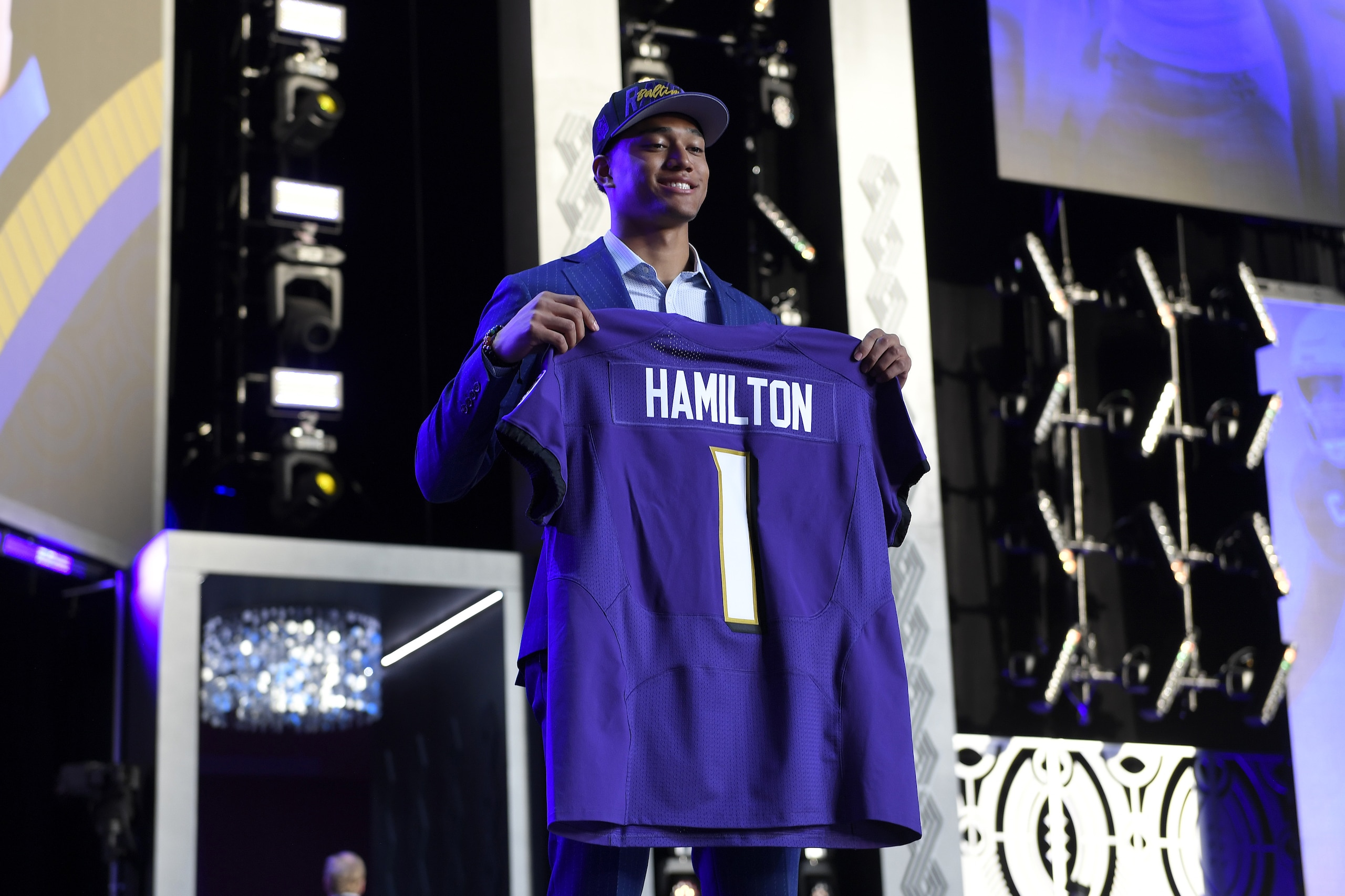 LAS VEGAS, NEVADA - APRIL 28: Kyle Hamilton poses onstage after being selected 14th by the Baltimore Ravens during round one of the 2022 NFL Draft on April 28, 2022 in Las Vegas, Nevada. (Photo by David Becker/Getty Images)