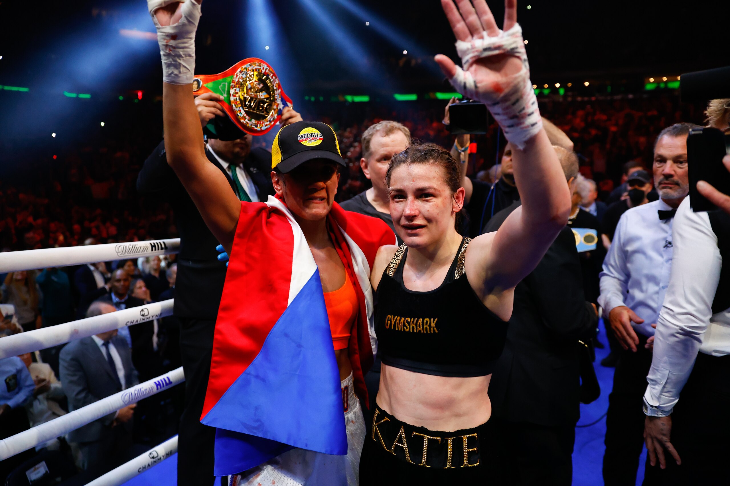 NEW YORK, NY - APRIL 30: Katie Taylor of Ireland and Amanda Serrano of Puerto Rico walk together in the ring after their fight for the Undisputed World Lightweight Championship on April 30, 2022 at Madison Square Garden In New York, New York. (Photo by Rich Graessle/Icon Sportswire via Getty Images) NEW YORK, NY - APRIL 30: Katie Taylor of Ireland and Amanda Serrano of Puerto Rico walk together in the ring after their fight for the Undisputed World Lightweight Championship on April 30, 2022 at Madison Square Garden In New York, New York. (Photo by Rich Graessle/Icon Sportswire via Getty Images)