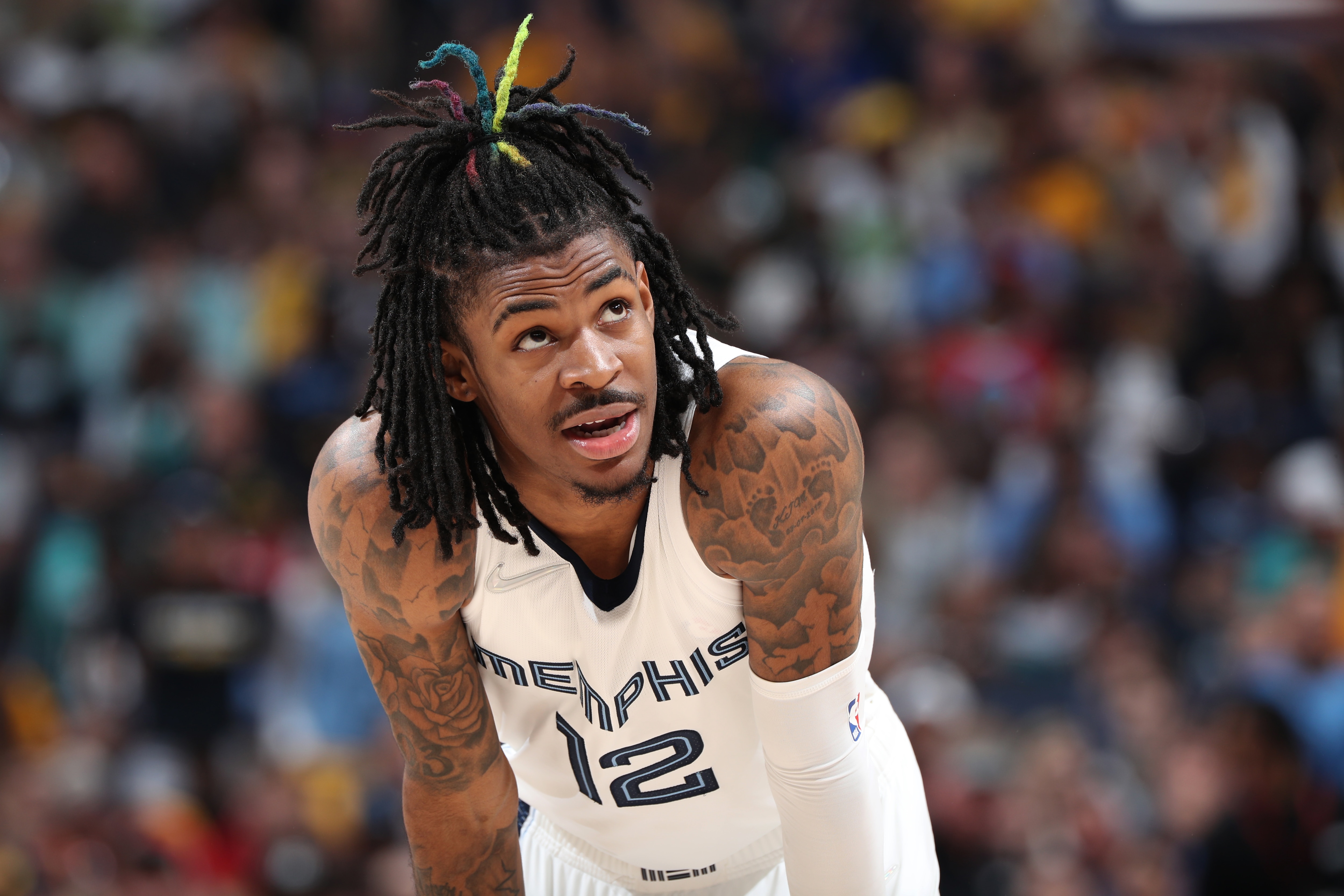 MEMPHIS, TN - MAY 1: Ja Morant #12 of the Memphis Grizzlies looks on during Game 1 of the 2022 NBA Playoffs Western Conference Semifinals on May 1, 2022 at FedExForum in Memphis, Tennessee. NOTE TO USER: User expressly acknowledges and agrees that, by downloading and or using this photograph, User is consenting to the terms and conditions of the Getty Images License Agreement. Mandatory Copyright Notice: Copyright 2022 NBAE (Photo by Joe Murphy/NBAE via Getty Images)