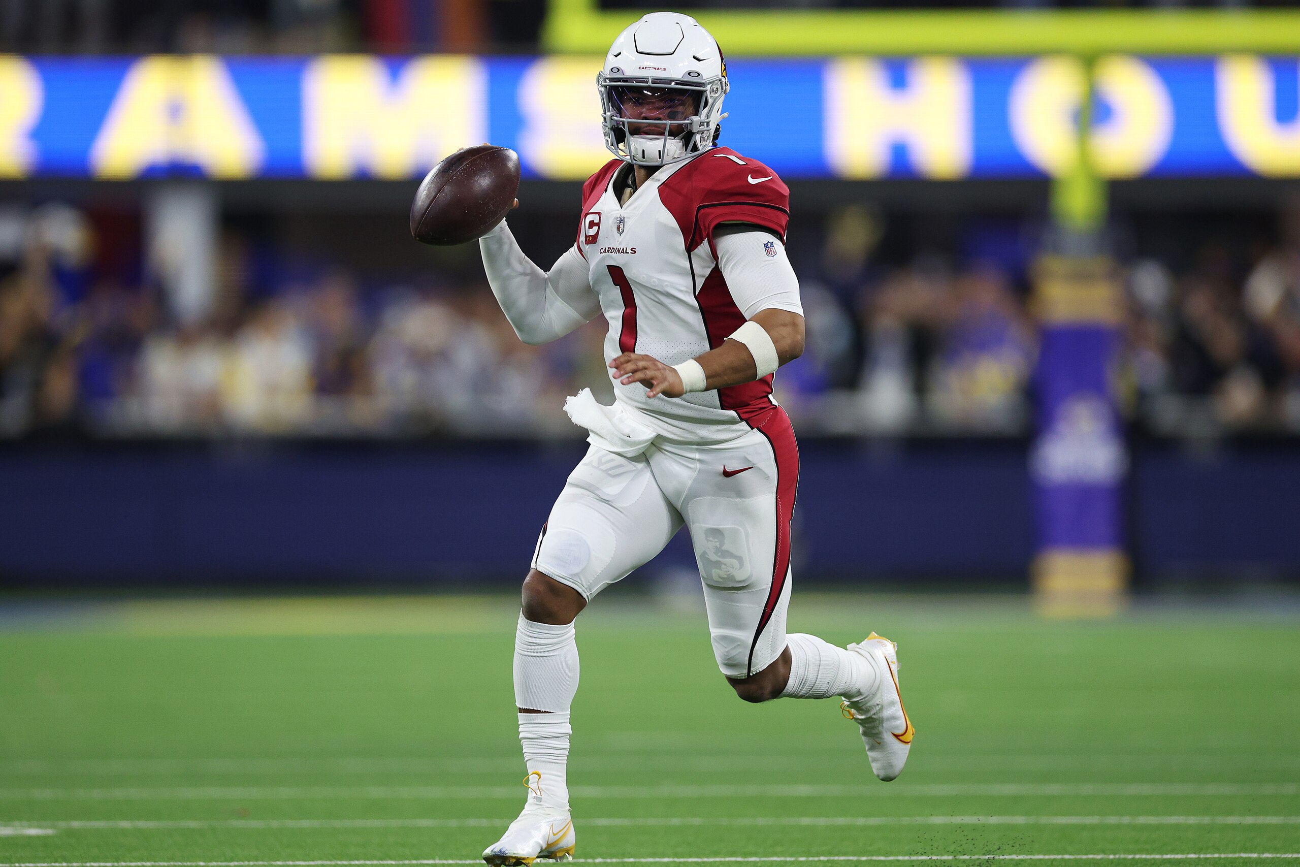 INGLEWOOD, CALIFORNIA - JANUARY 17: Kyler Murray #1 of the Arizona Cardinals scrambles against the Los Angeles Rams during the fourth quarter in the NFC Wild Card Playoff game at SoFi Stadium on January 17, 2022 in Inglewood, California. (Photo by Harry How/Getty Images) INGLEWOOD, CALIFORNIA - JANUARY 17: Kyler Murray #1 of the Arizona Cardinals scrambles against the Los Angeles Rams during the fourth quarter in the NFC Wild Card Playoff game at SoFi Stadium on January 17, 2022 in Inglewood, California. (Photo by Harry How/Getty Images)