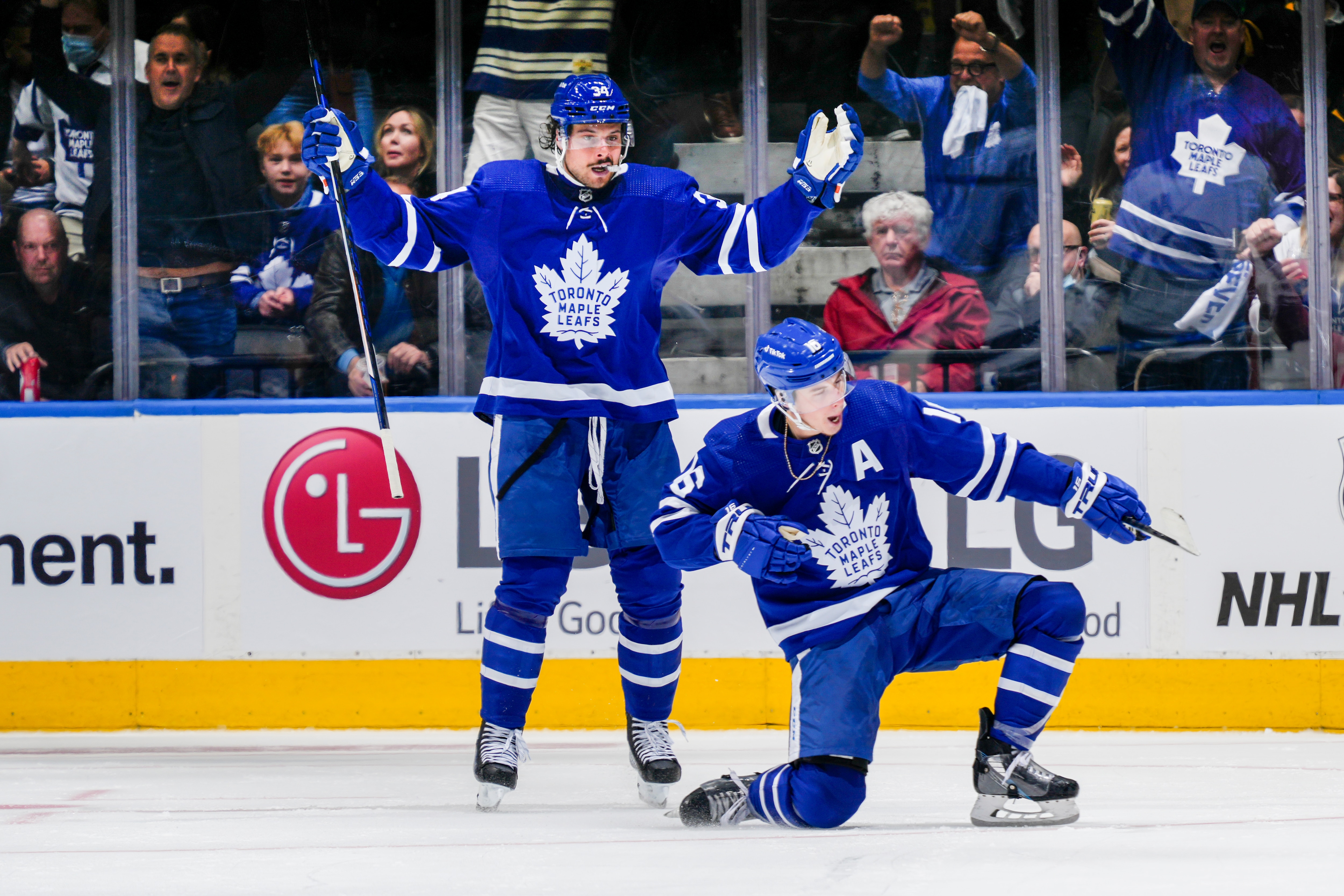 TORONTO, ON - MAY 2: Mitch Marner #16 of the Toronto Maple Leafs celebrates his goal against the Tampa Bay Lightning with teammate Auston Matthews #34 during the second period in Game One of the First Round of the 2022 Stanley Cup Playoffs at the Scotiabank Arena on May 2, 2022 in Toronto, Ontario, Canada. (Photo by Mark Blinch/NHLI via Getty Images)