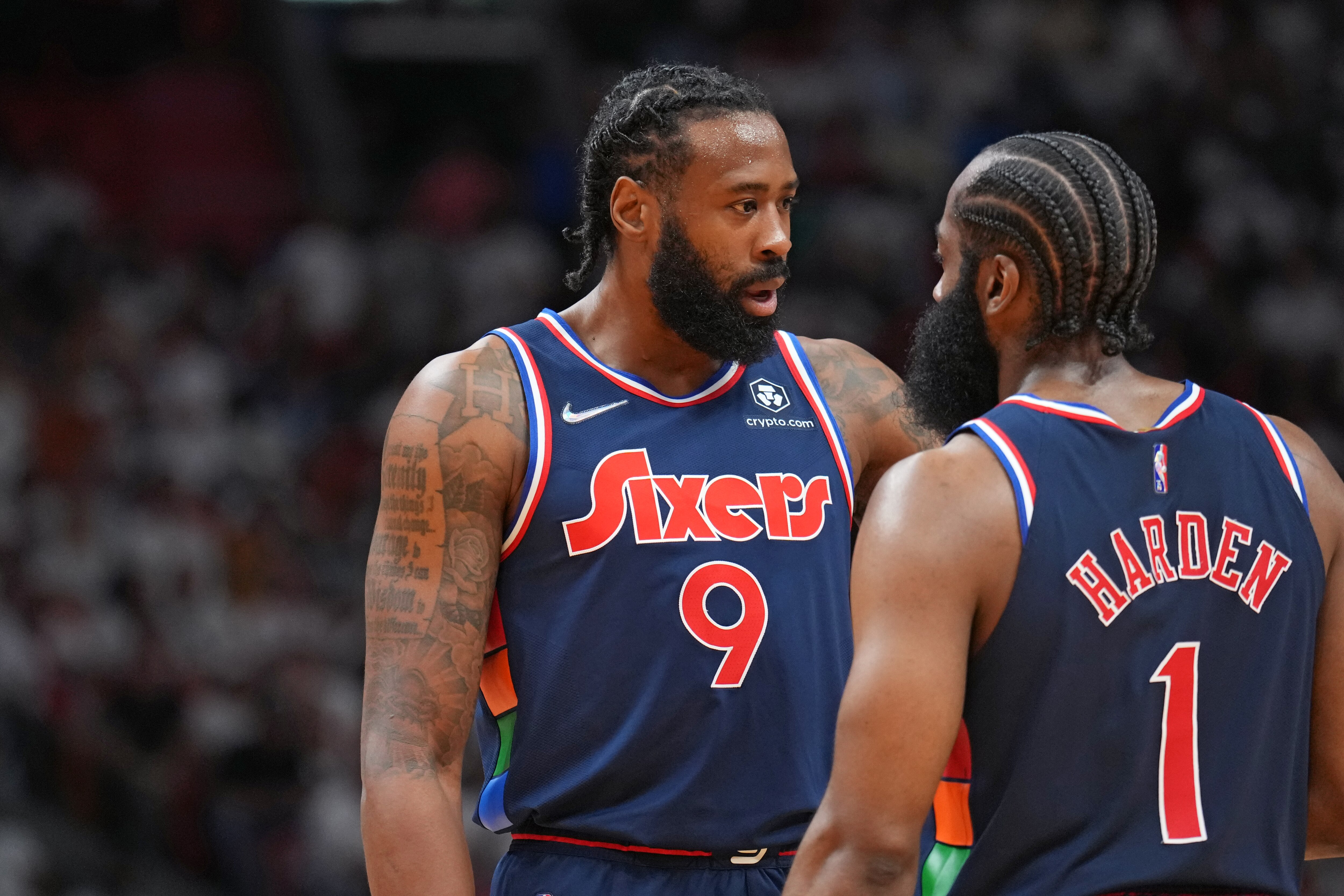 MIAMI, FL - MAY 2: DeAndre Jordan #9 of the Philadelphia 76ers and James Harden #1 of the Philadelphia 76ers talk during a game against the Miami Heat during Game 1 of the 2022 NBA Playoffs Eastern Conference Semifinals on May 2, 2022 at The FTX Arena in Miami, Florida. NOTE TO USER: User expressly acknowledges and agrees that, by downloading and/or using this Photograph, user is consenting to the terms and conditions of the Getty Images License Agreement. Mandatory Copyright Notice: Copyright 2022 NBAE (Photo by Jesse D. Garrabrant/NBAE via Getty Images)