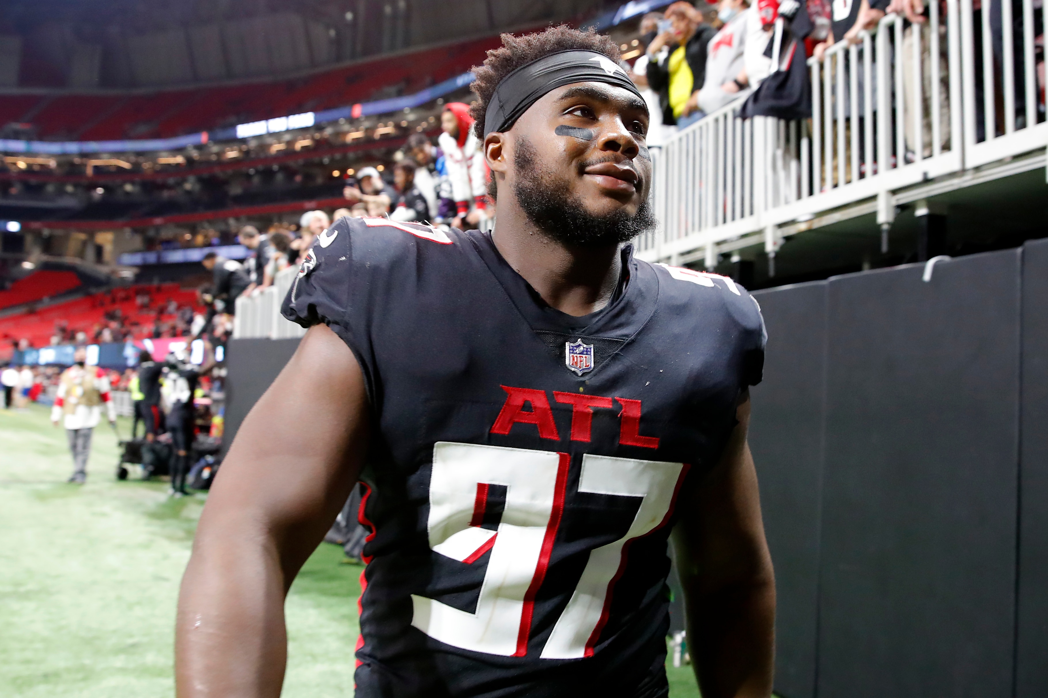 ATLANTA, GEORGIA - JANUARY 09: Grady Jarrett #97 of the Atlanta Falcons walks off the field after a loss to the New Orleans Saints at Mercedes-Benz Stadium on January 09, 2022 in Atlanta, Georgia. (Photo by Todd Kirkland/Getty Images)