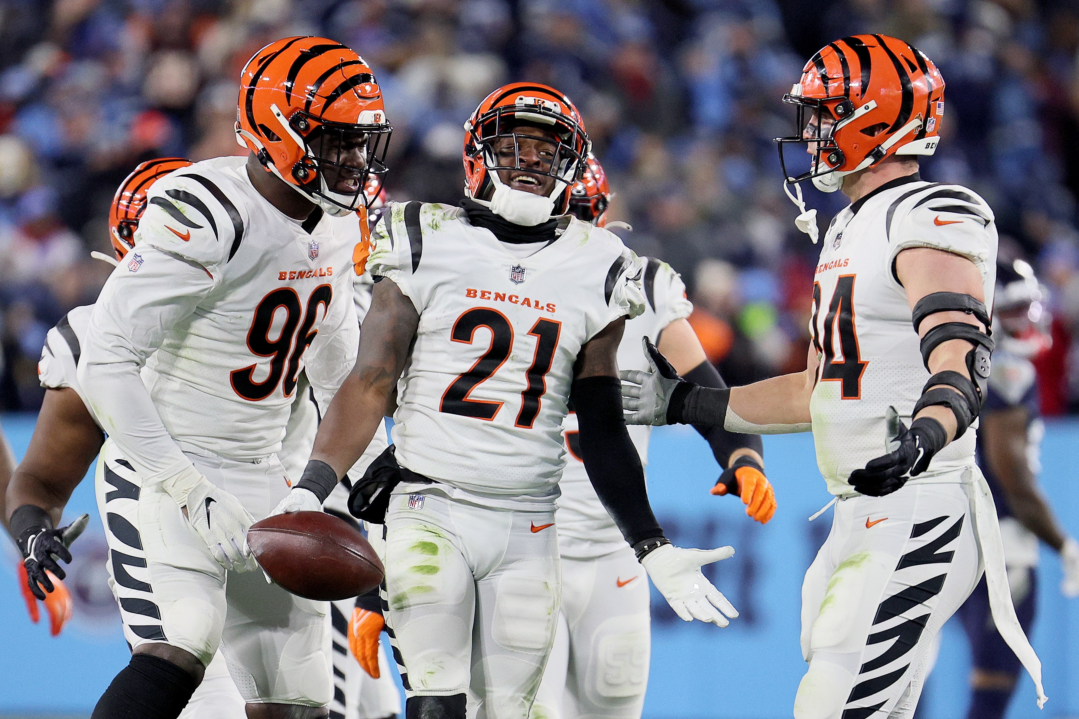 NASHVILLE, TENNESSEE - JANUARY 22: Cornerback Mike Hilton #21 of the Cincinnati Bengals celebrates after intercepting a third quarter pass against the Tennessee Titans in the AFC Divisional Playoff game at Nissan Stadium on January 22, 2022 in Nashville, Tennessee. (Photo by Andy Lyons/Getty Images)