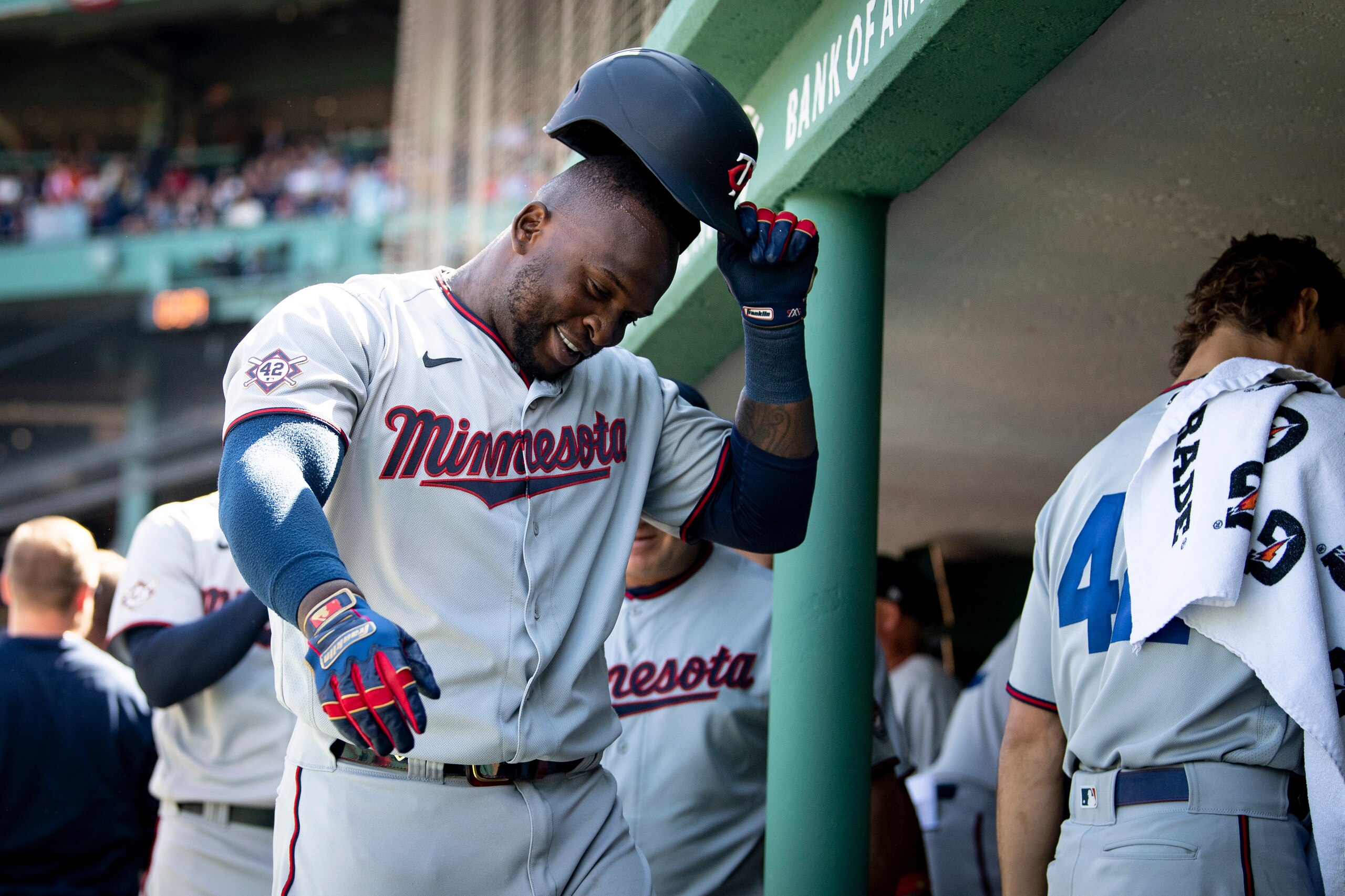 BOSTON, MA - APRIL 15:  Miguel Sano #22 of the Minnesota Twins reacts in the dugout after hitting a two-run home run in the second inning of the Opening Day game against the Boston Red Sox on April, 15, 2022 at Fenway Park in Boston, Massachusetts. (Photo by Maddie Malhotra/Boston Red Sox/Getty Images)