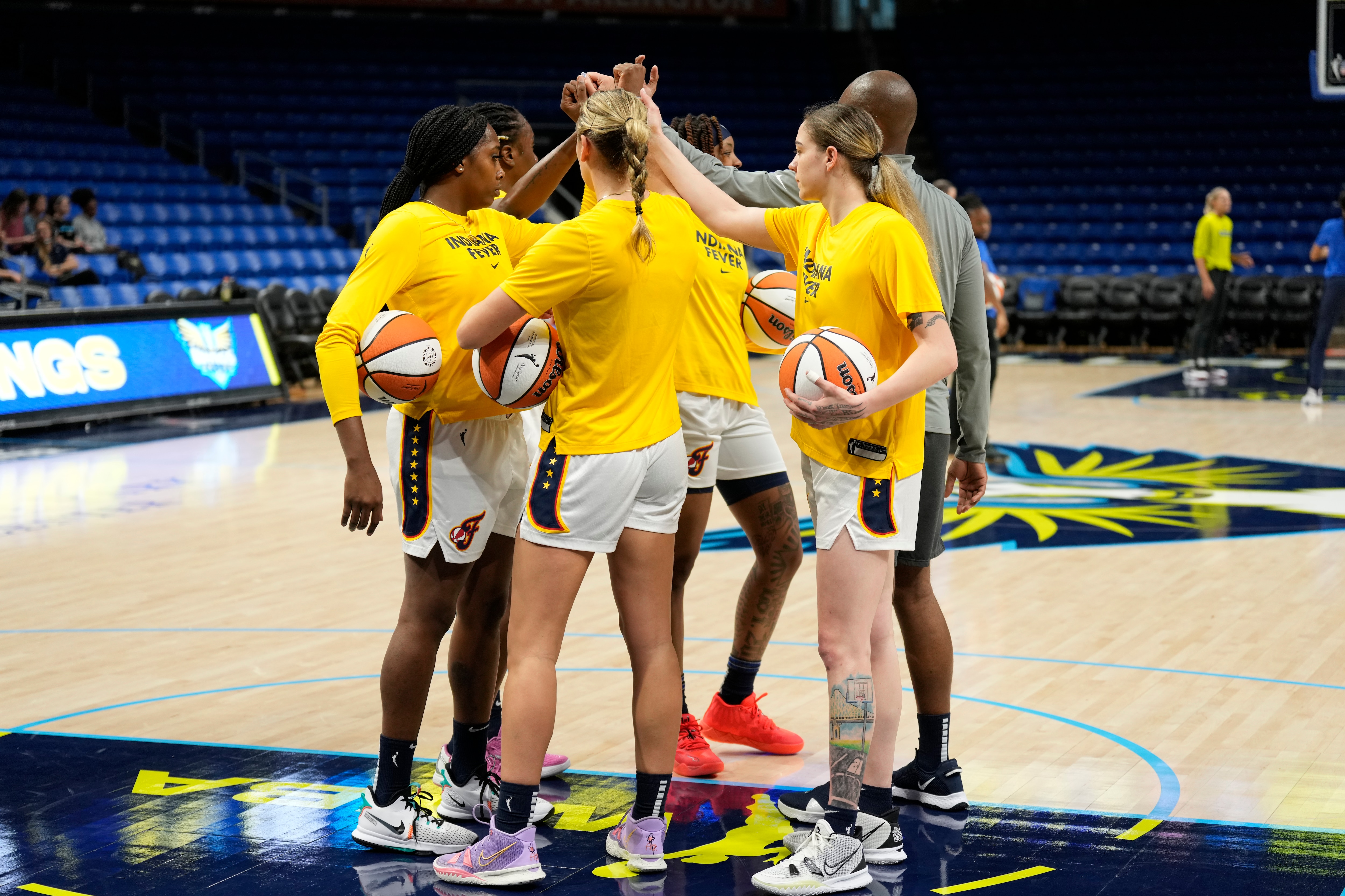 ARLINGTON, TX -  MAY 2: Indiana Fever huddle up before the preseason game against the Dallas Wings on May 2, 2022 at the College Park Center in Arlington, TX. NOTE TO USER: User expressly acknowledges and agrees that, by downloading and or using this photograph, User is consenting to the terms and conditions of the Getty Images License Agreement. Mandatory Copyright Notice: Copyright 2022 NBAE (Photo by Joshua Huston/NBAE via Getty Images)