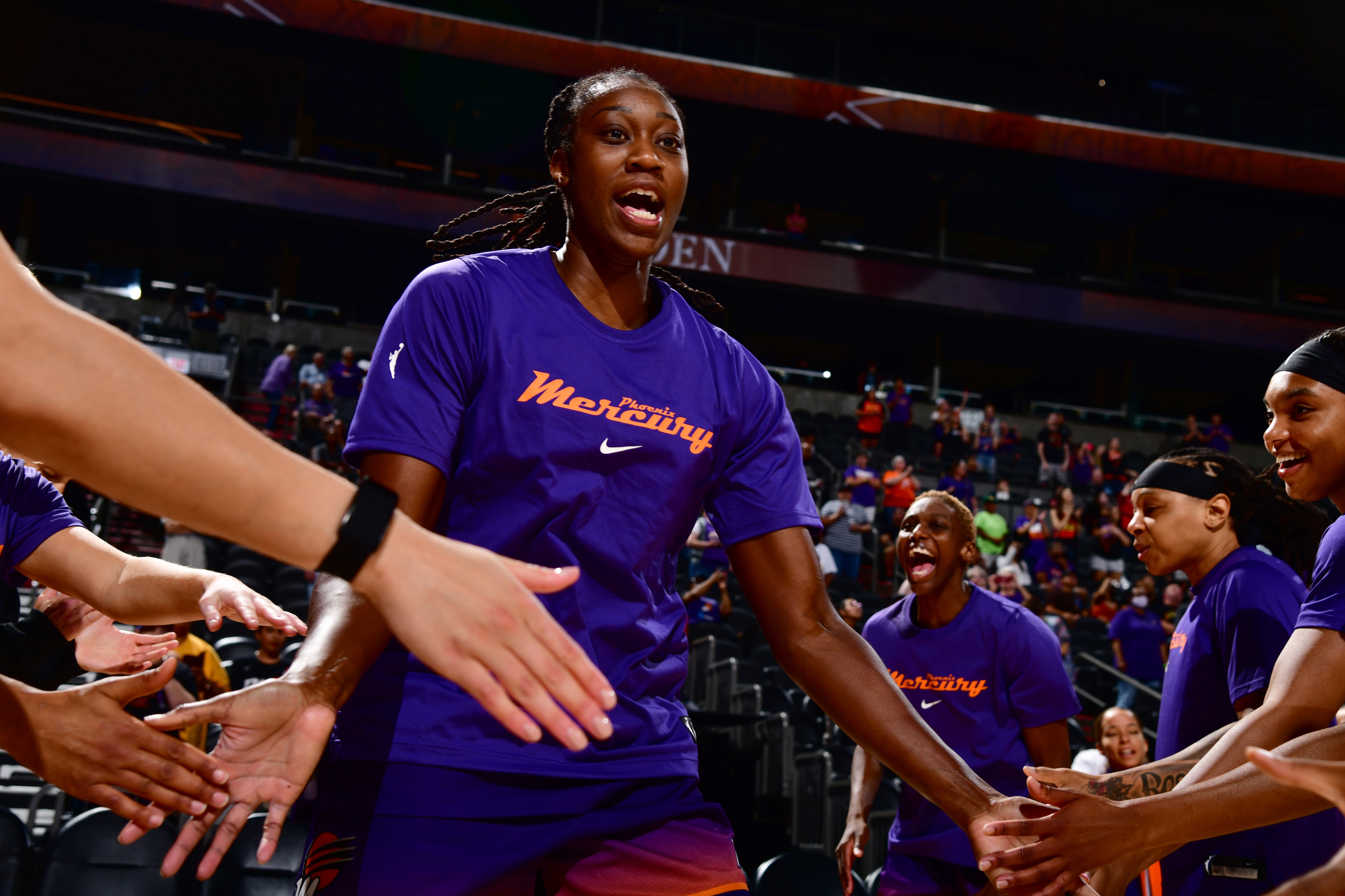 PHOENIX, AZ - APRIL 28: Tina Charles #31 of the Phoenix Mercury high fives teammates before the game against the Seattle Storm during a preseason game on April 28, 2022 at Footprint Center in Phoenix, Arizona. NOTE TO USER: User expressly acknowledges and agrees that, by downloading and or using this photograph, user is consenting to the terms and conditions of the Getty Images License Agreement. Mandatory Copyright Notice: Copyright 2022 NBAE (Photo by Barry Gossage/NBAE via Getty Images)