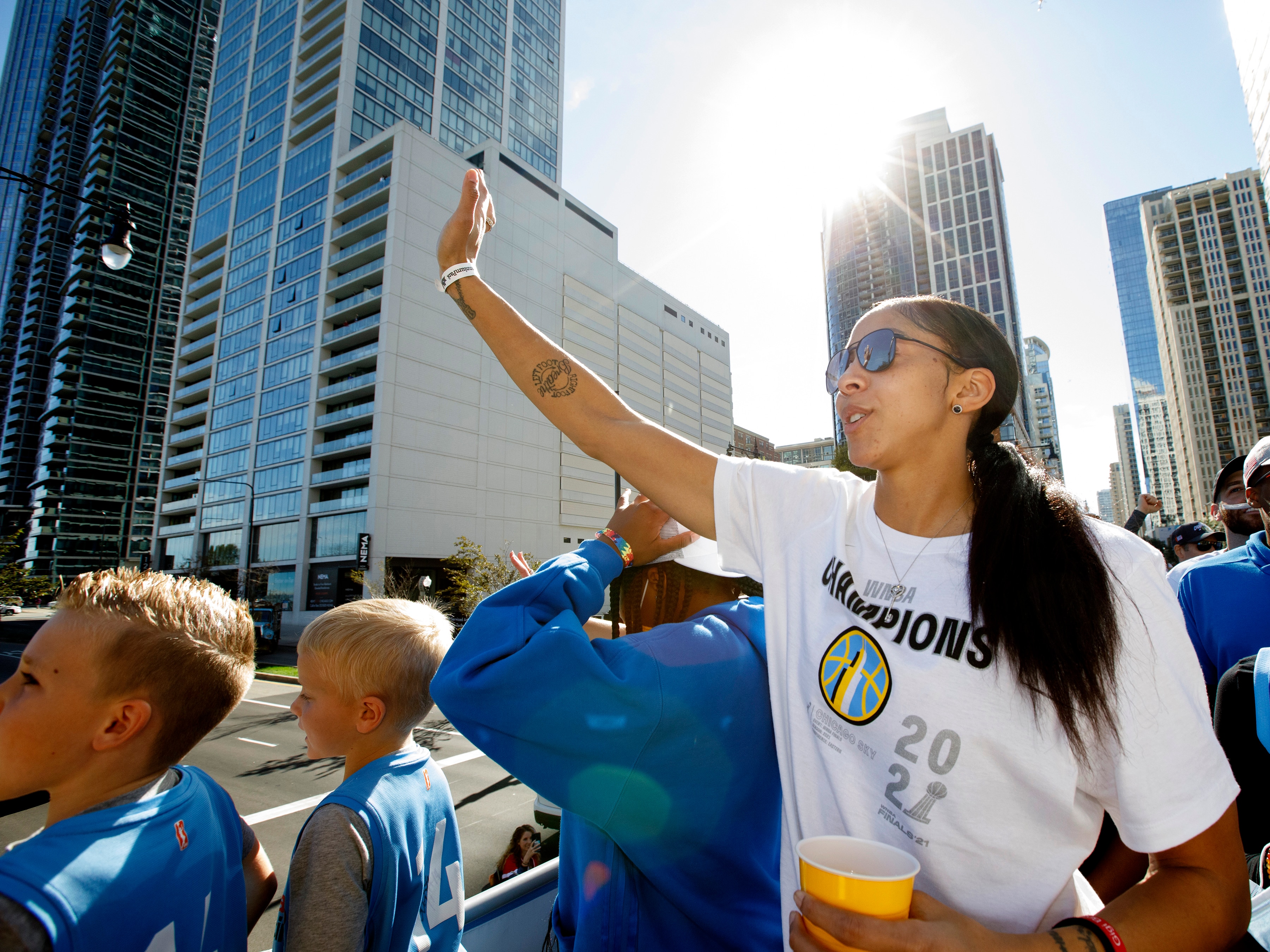 CHICAGO, IL - OCTOBER 19:  Candace Parker #3 of the Chicago Sky waves to fans during the 2021 Chicago Sky Championship Parade on October 19, 2021 in Chicago, Illinois. NOTE TO USER: User expressly acknowledges and agrees that, by downloading and or using this photograph, user is consenting to the terms and conditions of the Getty Images License Agreement.  Mandatory Copyright Notice: Copyright 2021 NBAE (Photo by Kena Krutsinger/NBAE via Getty Images)
