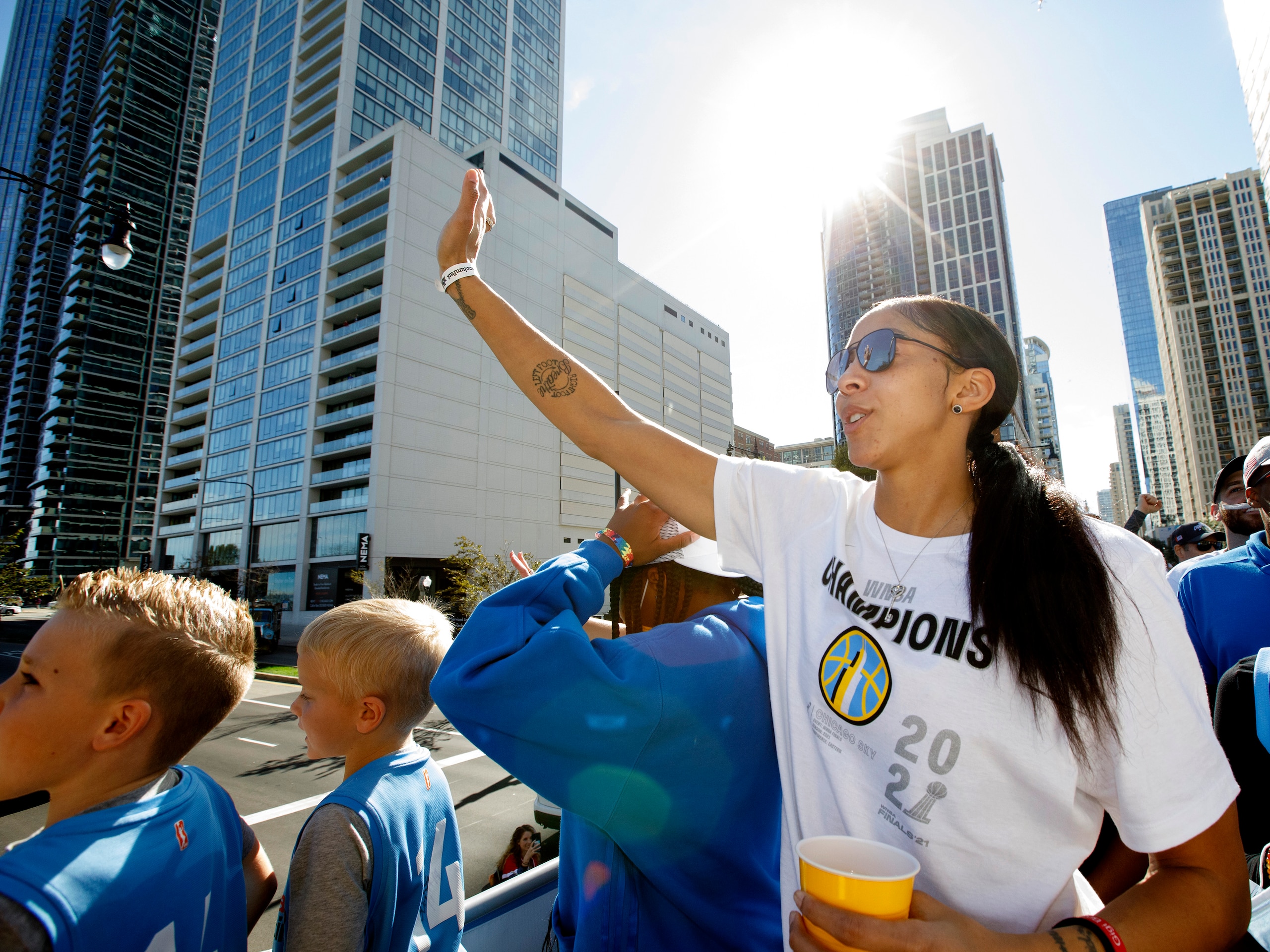 CHICAGO, IL - OCTOBER 19:  Candace Parker #3 of the Chicago Sky waves to fans during the 2021 Chicago Sky Championship Parade on October 19, 2021 in Chicago, Illinois. NOTE TO USER: User expressly acknowledges and agrees that, by downloading and or using this photograph, user is consenting to the terms and conditions of the Getty Images License Agreement.  Mandatory Copyright Notice: Copyright 2021 NBAE (Photo by Kena Krutsinger/NBAE via Getty Images)