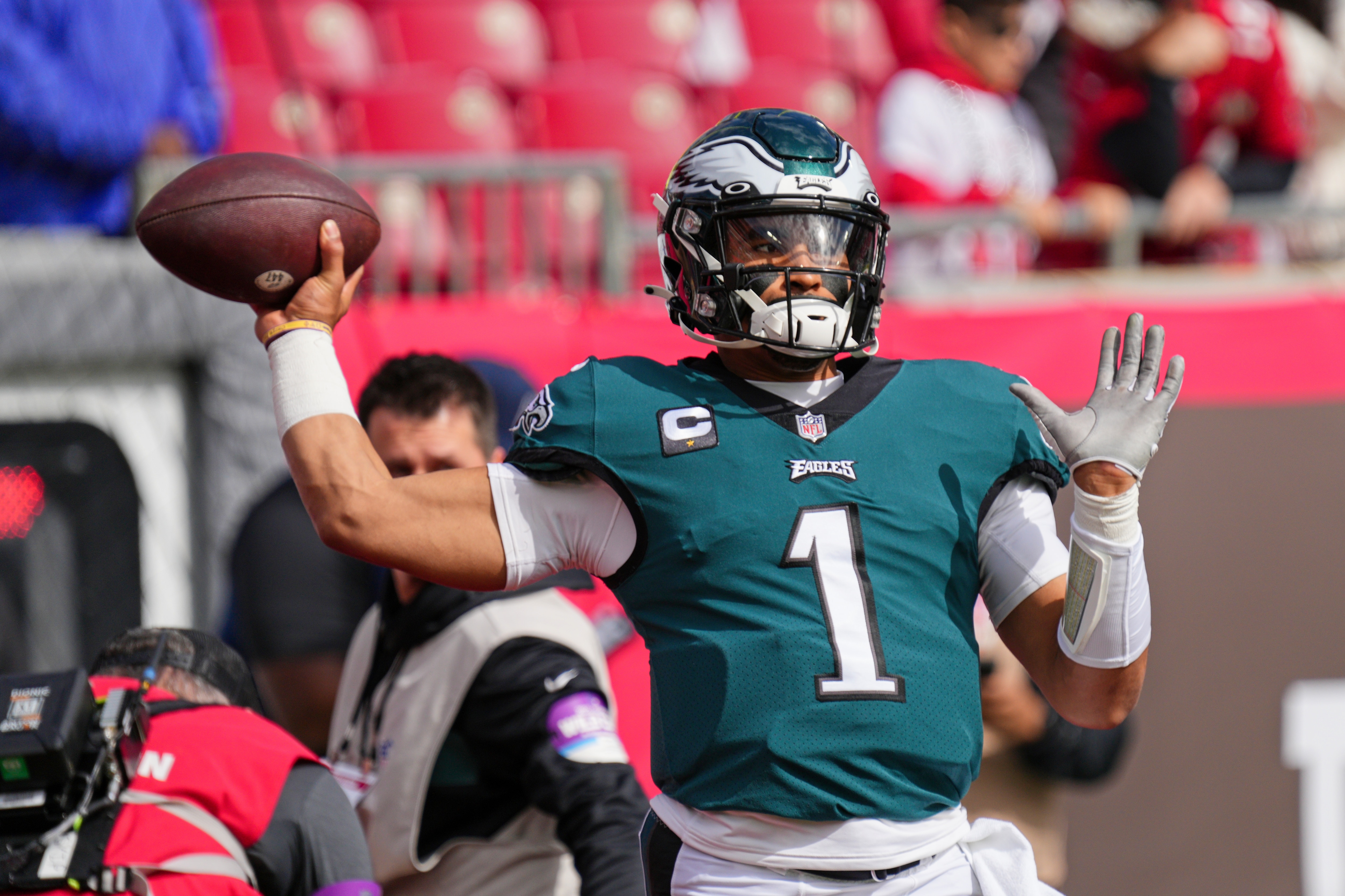 TAMPA, FL - JANUARY 16:Philadelphia Eagles quarterback Jalen Hurts (1) warms up during the game between the Philadelphia Eagles and the Tampa Bay Buccaneers on January 16, 2022 at  Raymond James Stadium in Tampa, FL. (Photo by Andy Lewis/Icon Sportswire via Getty Images)
