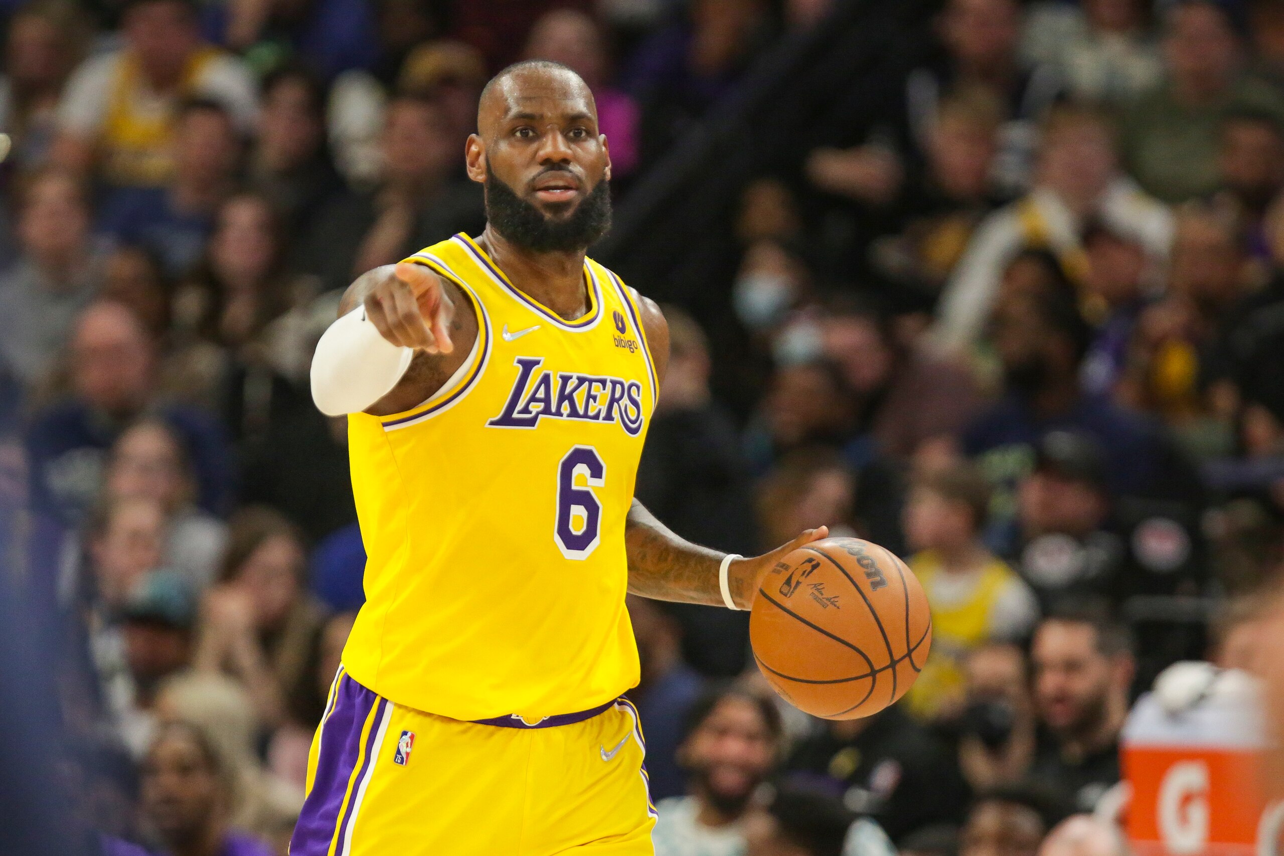 Los Angeles Lakers forward LeBron James dribbles during an NBA basketball game against the Minnesota Timberwolves Wednesday, March 16, 2022, in Minneapolis. (AP Photo/Andy Clayton-King)
