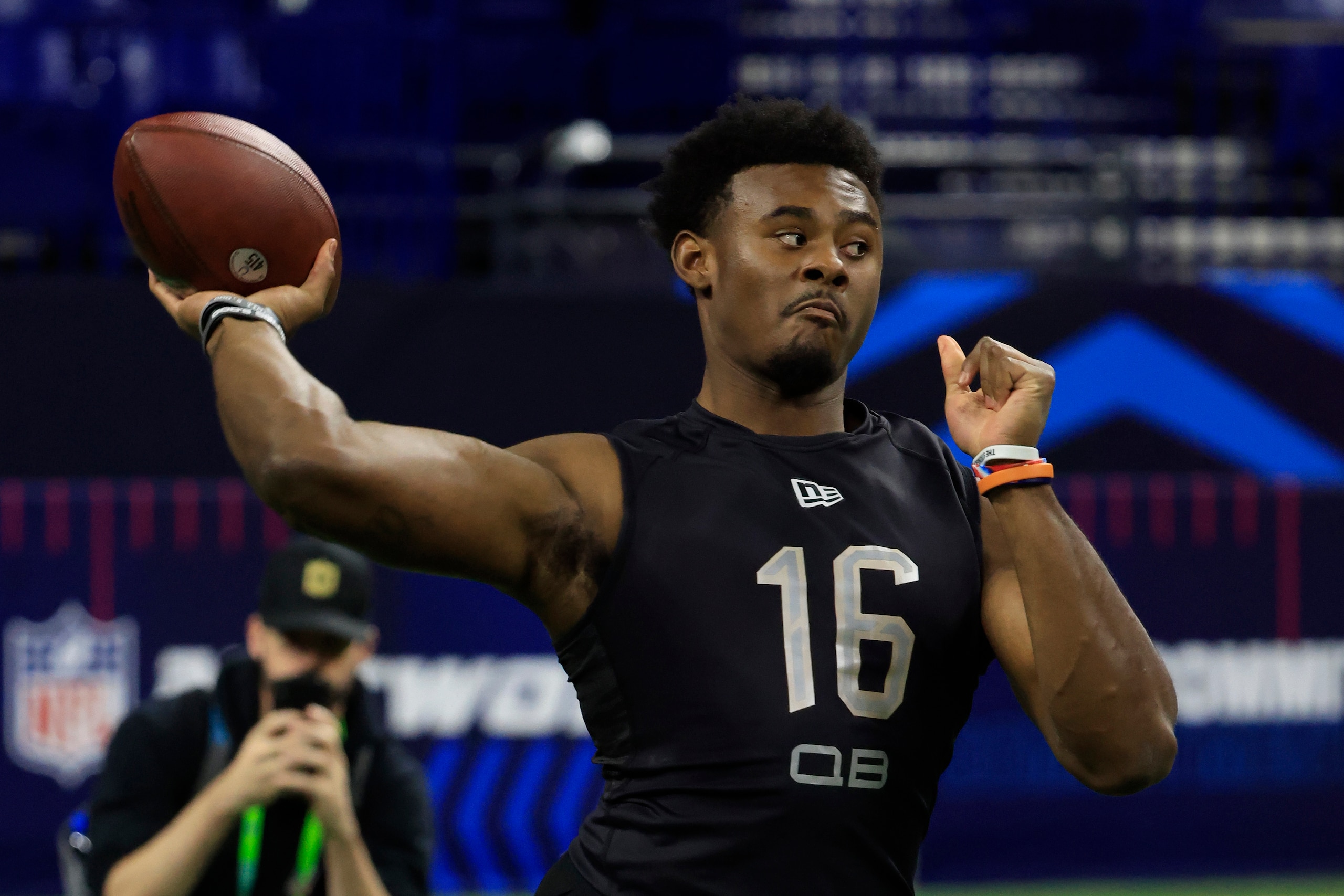 INDIANAPOLIS, INDIANA - MARCH 03: Malik Willis #QB16 of the Liberty Flames throws during the NFL Combine at Lucas Oil Stadium on March 03, 2022 in Indianapolis, Indiana. (Photo by Justin Casterline/Getty Images)