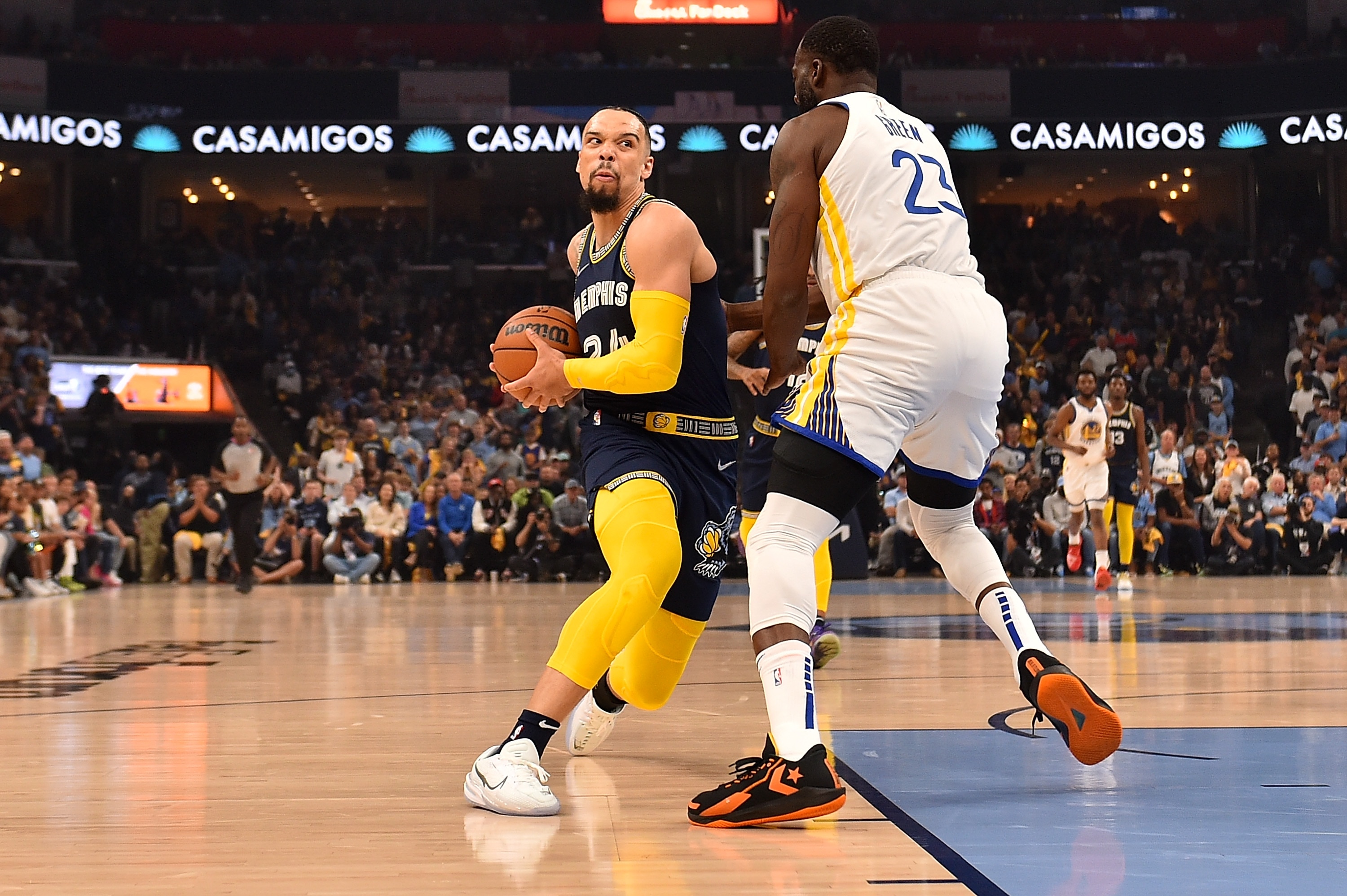 MEMPHIS, TENNESSEE - MAY 03: Dillon Brooks #24 of the Memphis Grizzlies goes to the basket against Draymond Green #23 of the Golden State Warriors during Game Two of the Western Conference Semifinals of the NBA Playoffs at FedExForum on May 03, 2022 in Memphis, Tennessee. NOTE TO USER: User expressly acknowledges and agrees that, by downloading and or using this photograph, User is consenting to the terms and conditions of the Getty Images License Agreement. (Photo by Justin Ford/Getty Images)