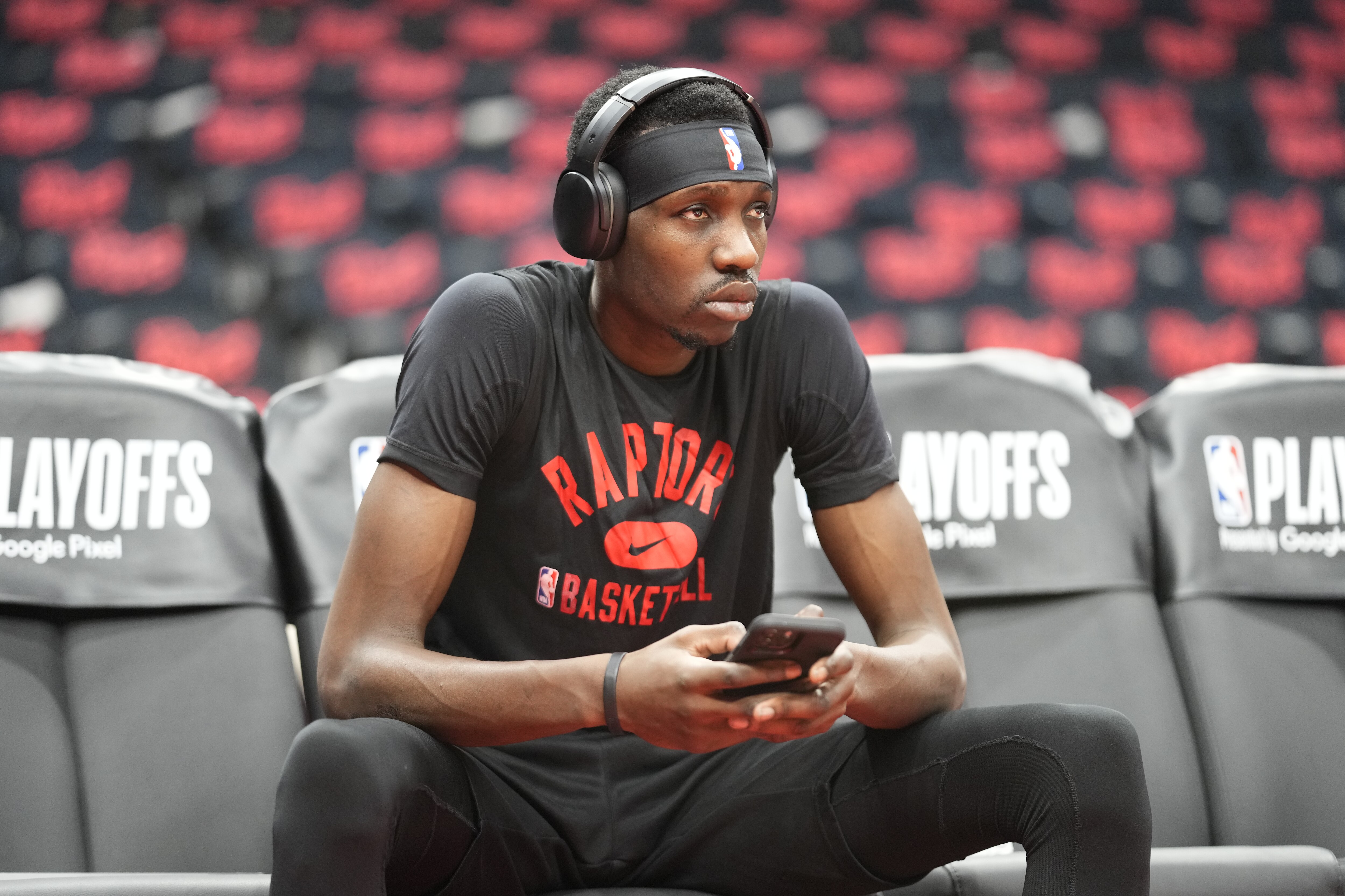 TORONTO, CANADA - APRIL 28: Chris Boucher #25 of the Toronto Raptors looks on before Round 1 Game 5 of the 2022 NBA Playoffs against Philadelphia 76ers on April 28, 2022 at the Scotiabank Arena in Toronto, Ontario, Canada.  NOTE TO USER: User expressly acknowledges and agrees that, by downloading and or using this Photograph, user is consenting to the terms and conditions of the Getty Images License Agreement.  Mandatory Copyright Notice: Copyright 2022 NBAE (Photo by Mark Blinch/NBAE via Getty Images)