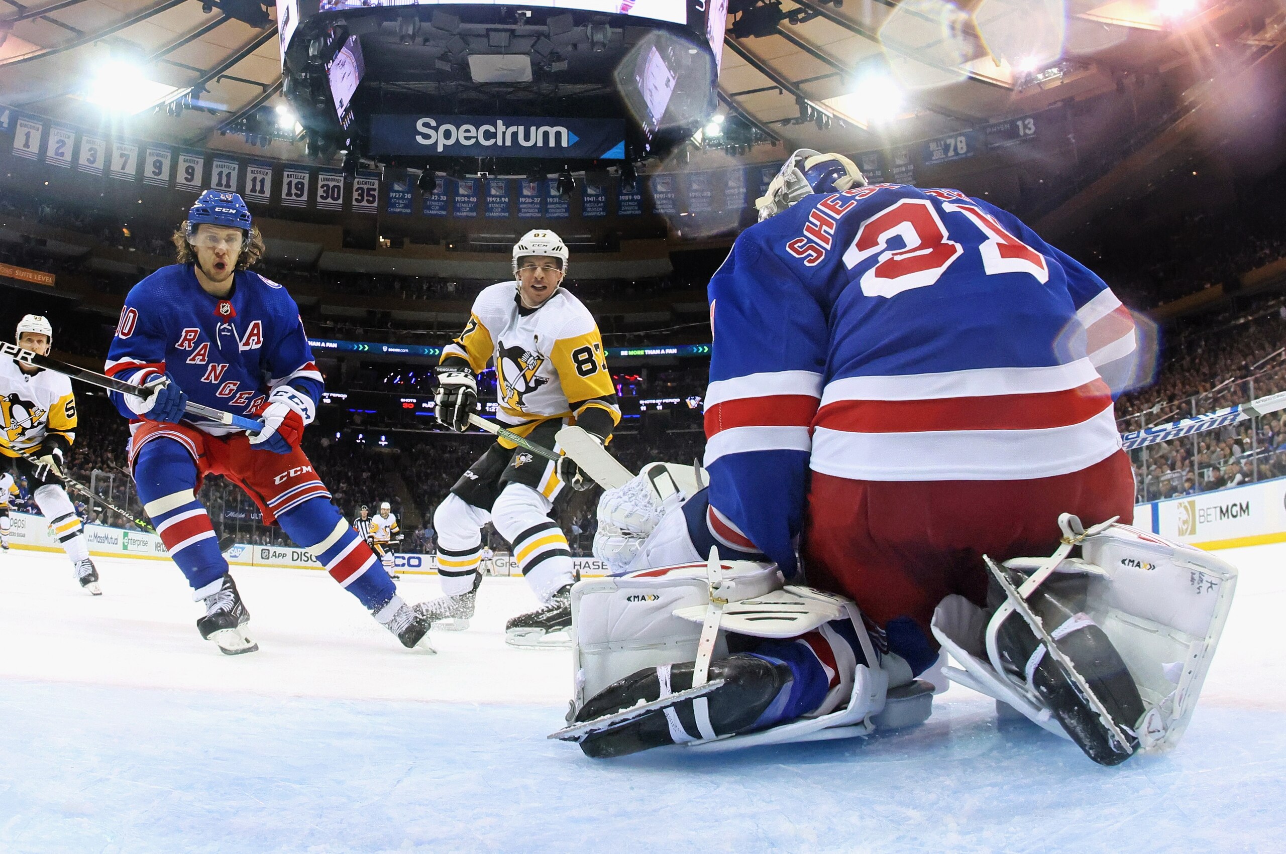 NEW YORK, NEW YORK - MAY 05: Artemi Panarin #10 and Igor Shesterkin #31 of the New York Rangers defend against Sidney Crosby #87 of the Pittsburgh Penguins during the second period in Game Two of the First Round of the 2022 Stanley Cup Playoffs at Madison Square Garden on May 05, 2022 in New York City. The Rangers defeated the Penguins 5-2. (Photo by Bruce Bennett/Getty Images)