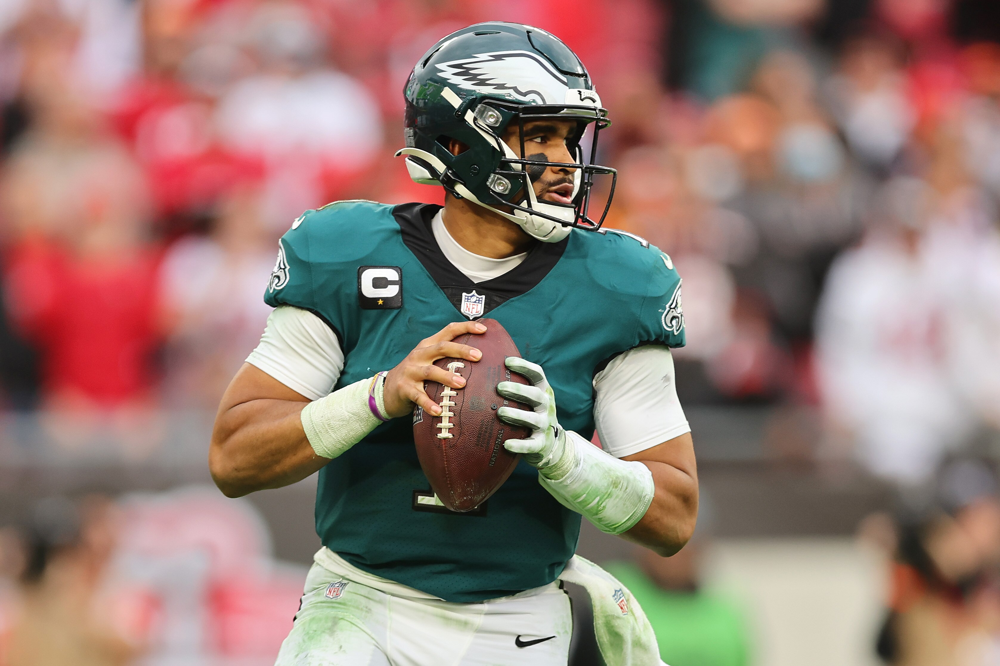 TAMPA, FLORIDA - JANUARY 16: Jalen Hurts #1 of the Philadelphia Eagles looks to pass against the Tampa Bay Buccaneers in the second half of the NFC Wild Card Playoff game at Raymond James Stadium on January 16, 2022 in Tampa, Florida.  (Photo by Michael Reaves/Getty Images)