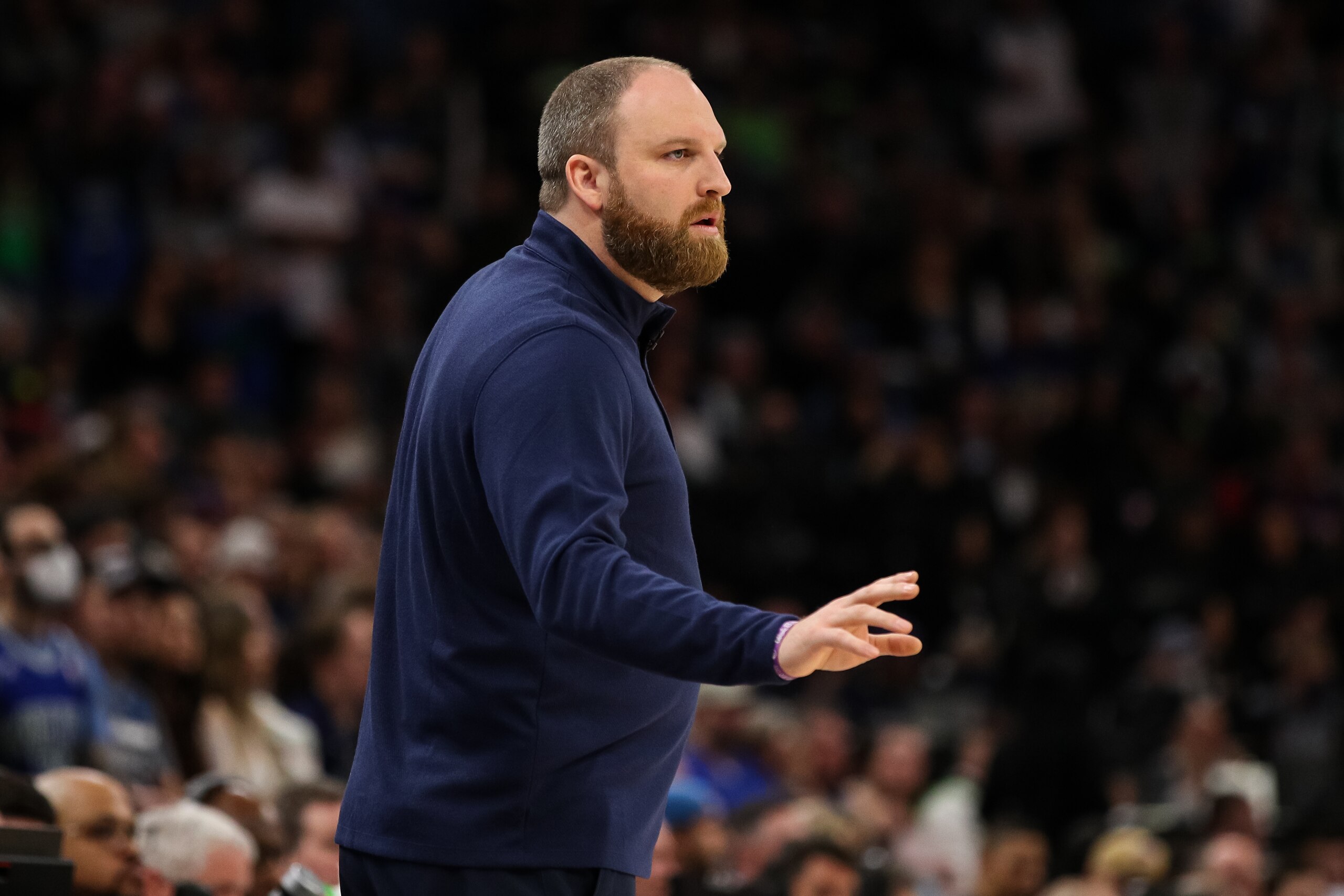 MINNEAPOLIS, MN - APRIL 23: Head coach Taylor Jenkins of the Memphis Grizzlies looks on against the Minnesota Timberwolves in the first quarter of the game during Game Four of the Western Conference First Round at Target Center on April 23, 2022 in Minneapolis, Minnesota. The Timberwolves defeated the Grizzlies 119-118 to tie the series 2-2. NOTE TO USER: User expressly acknowledges and agrees that, by downloading and or using this Photograph, user is consenting to the terms and conditions of the Getty Images License Agreement. (Photo by David Berding/Getty Images)
