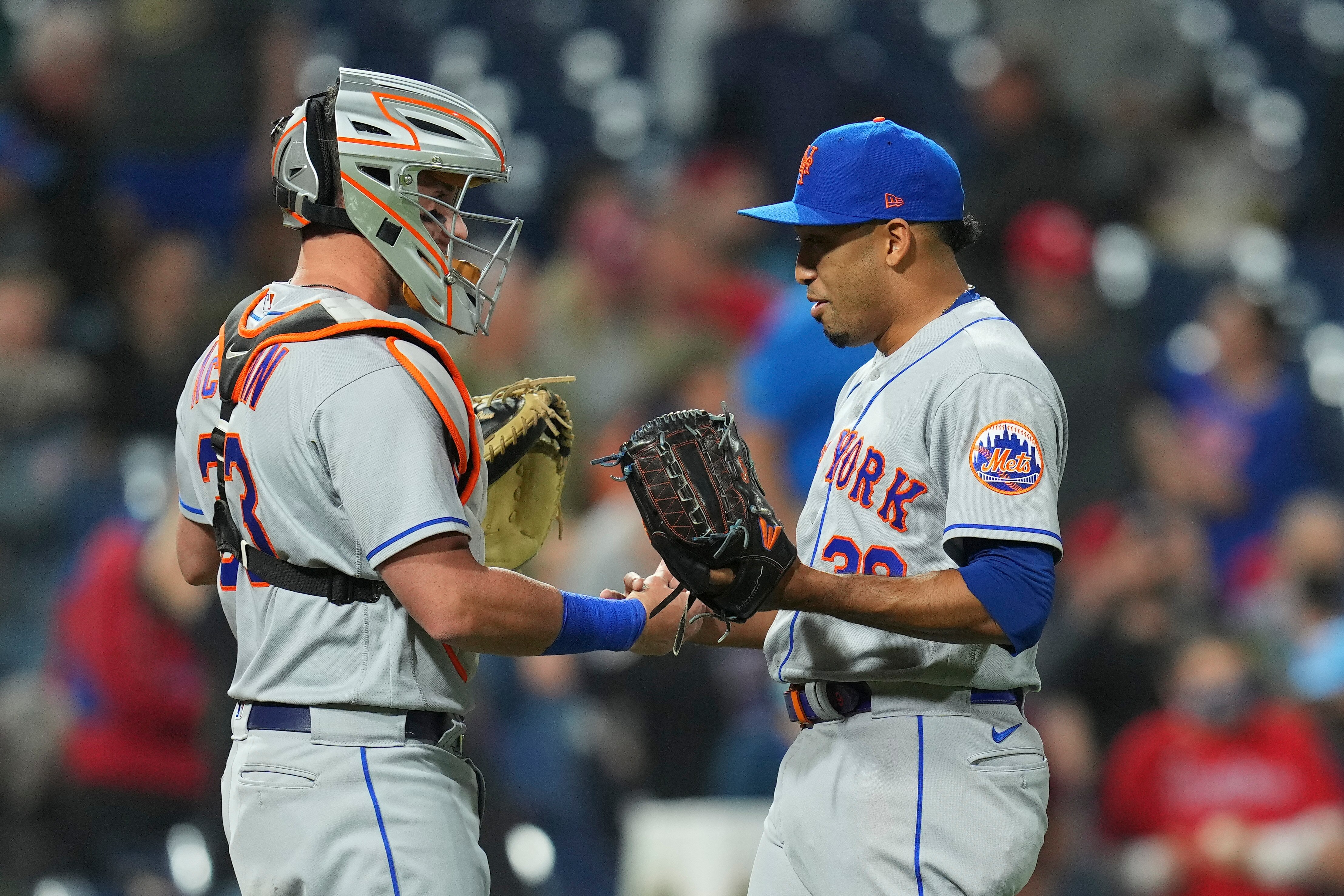 PHILADELPHIA, PA - MAY 05: James McCann #33 of the New York Mets celebrates with Edwin Diaz #39 after the game against the Philadelphia Phillies at Citizens Bank Park on May 5, 2022 in Philadelphia, Pennsylvania. The Mets defeated the Phillies 8-7. (Photo by Mitchell Leff/Getty Images)