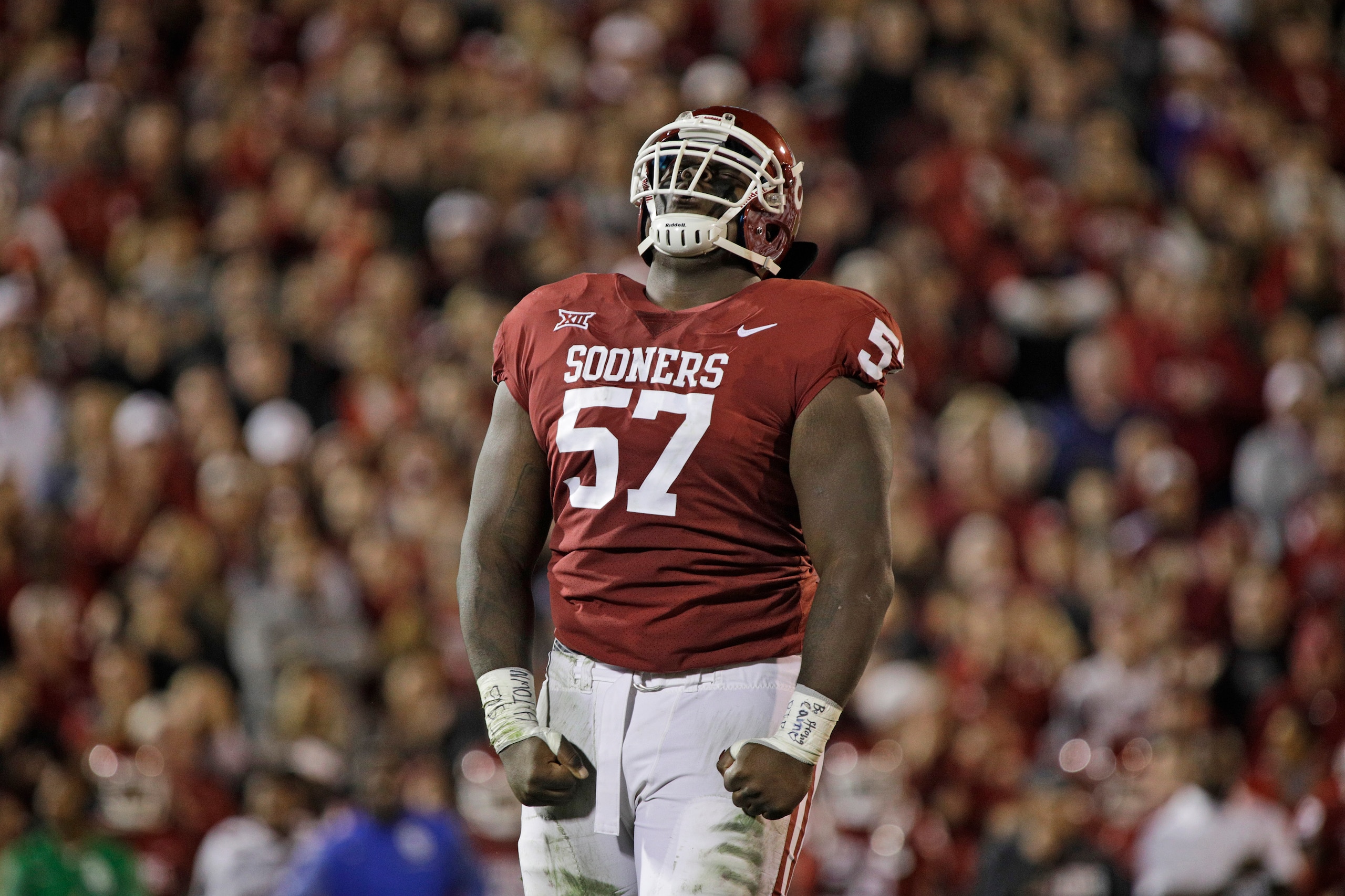 NORMAN, OK - NOVEMBER 11: Defensive tackle Du'Vonta Lampkin #57 of the Oklahoma Sooners celebrates a defensive stop against the TCU Horned Frogs at Gaylord Family Oklahoma Memorial Stadium on November 11, 2017 in Norman, Oklahoma. Oklahoma defeated TCU 38-20. (Photo by Brett Deering/Getty Images)