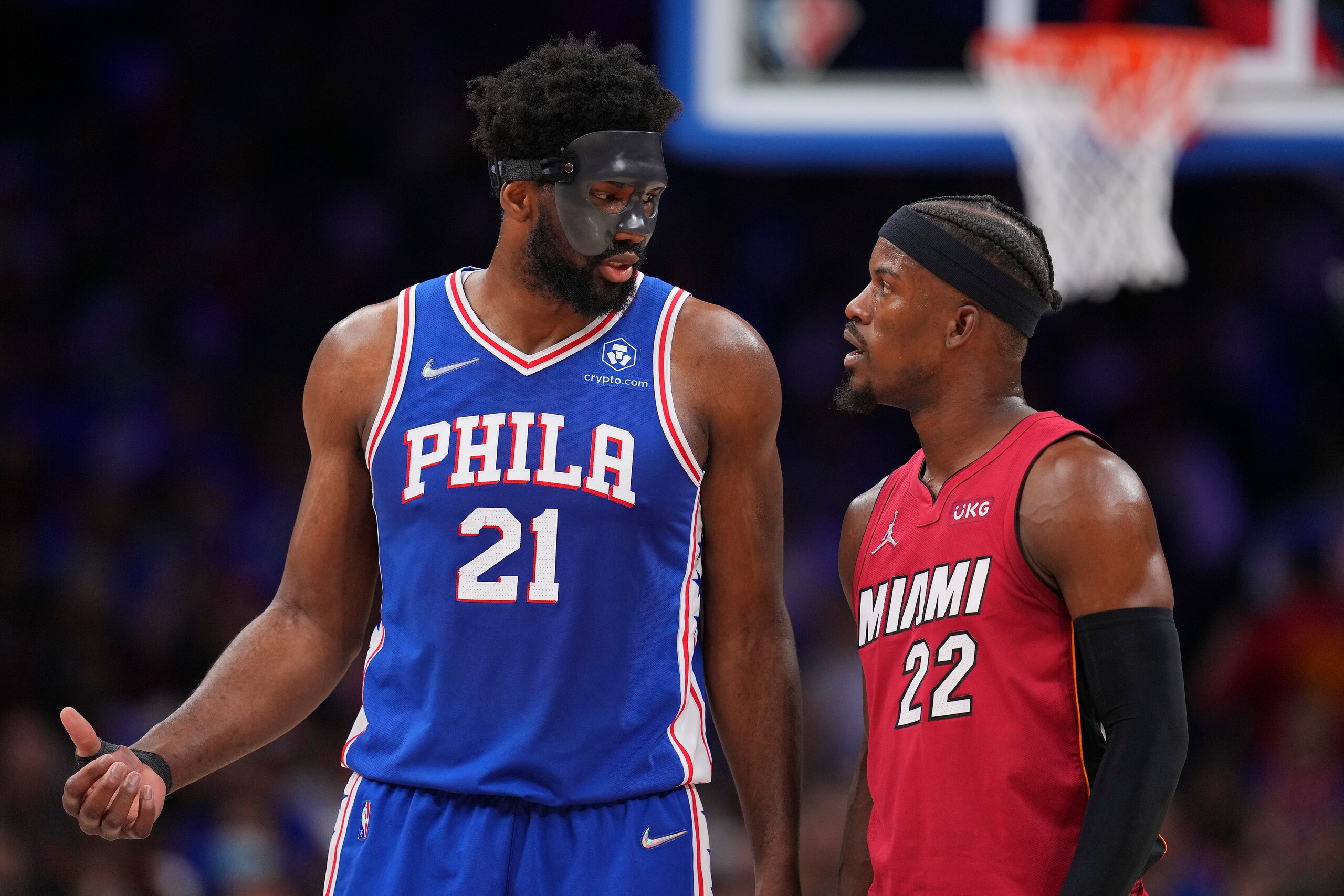 PHILADELPHIA, PA - MAY 06: Joel Embiid #21 of the Philadelphia 76ers talks to Jimmy Butler #22 of the Miami Heat during Game Three of the 2022 NBA Playoffs Eastern Conference Semifinals at the Wells Fargo Center on May 6, 2022 in Philadelphia, Pennsylvania. The 76ers defeated the Heat 99-79. NOTE TO USER: User expressly acknowledges and agrees that, by downloading and or using this photograph, User is consenting to the terms and conditions of the Getty Images License Agreement. (Photo by Mitchell Leff/Getty Images)