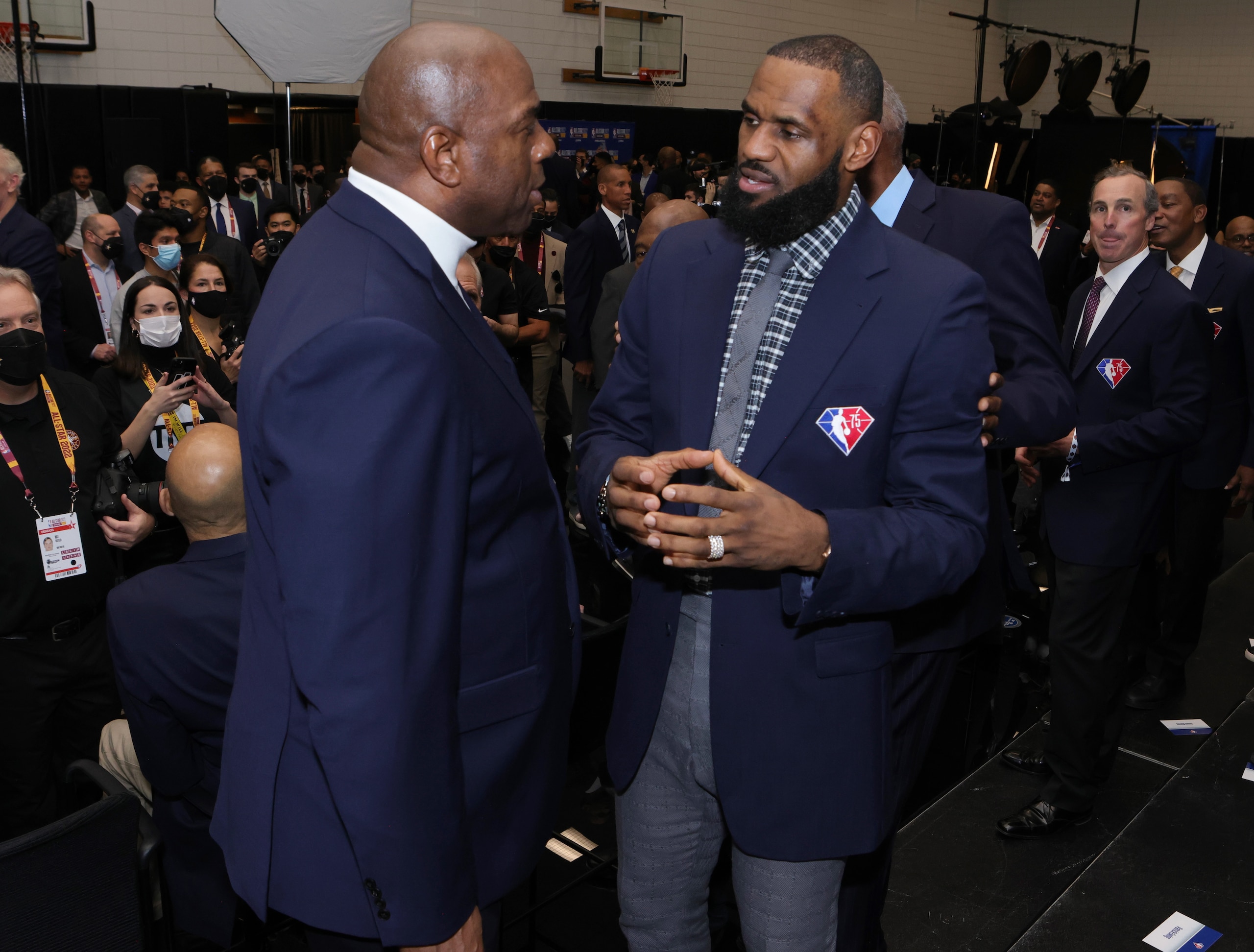 CLEVELAND, OH - FEBRUARY 20: Magic Johnson of the NBA 75th Anniversary team talks to LeBron James #6 of the Los Angeles Lakers during the 2022 NBA All-Star Game as part of 2022 NBA All Star Weekend on February 20, 2022 at Rocket Mortgage FieldHouse in Cleveland, Ohio. NOTE TO USER: User expressly acknowledges and agrees that, by downloading and/or using this Photograph, user is consenting to the terms and conditions of the Getty Images License Agreement. Mandatory Copyright Notice: Copyright 2022 NBAE (Photo by Jim Poorten/NBAE via Getty Images)