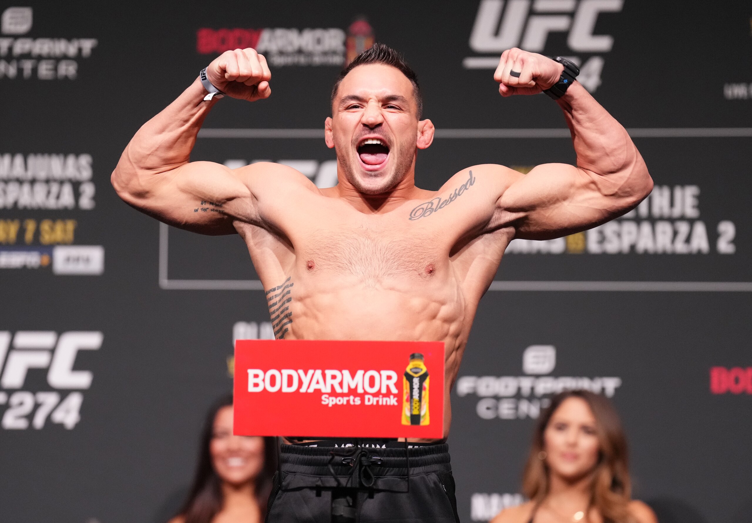 PHOENIX, ARIZONA - MAY 06: Michael Chandler poses on the scale during the UFC 274 ceremonial weigh-in at the Arizona Federal Theatre on May 06, 2022 in Phoenix, Arizona. (Photo by Chris Unger/Zuffa LLC)