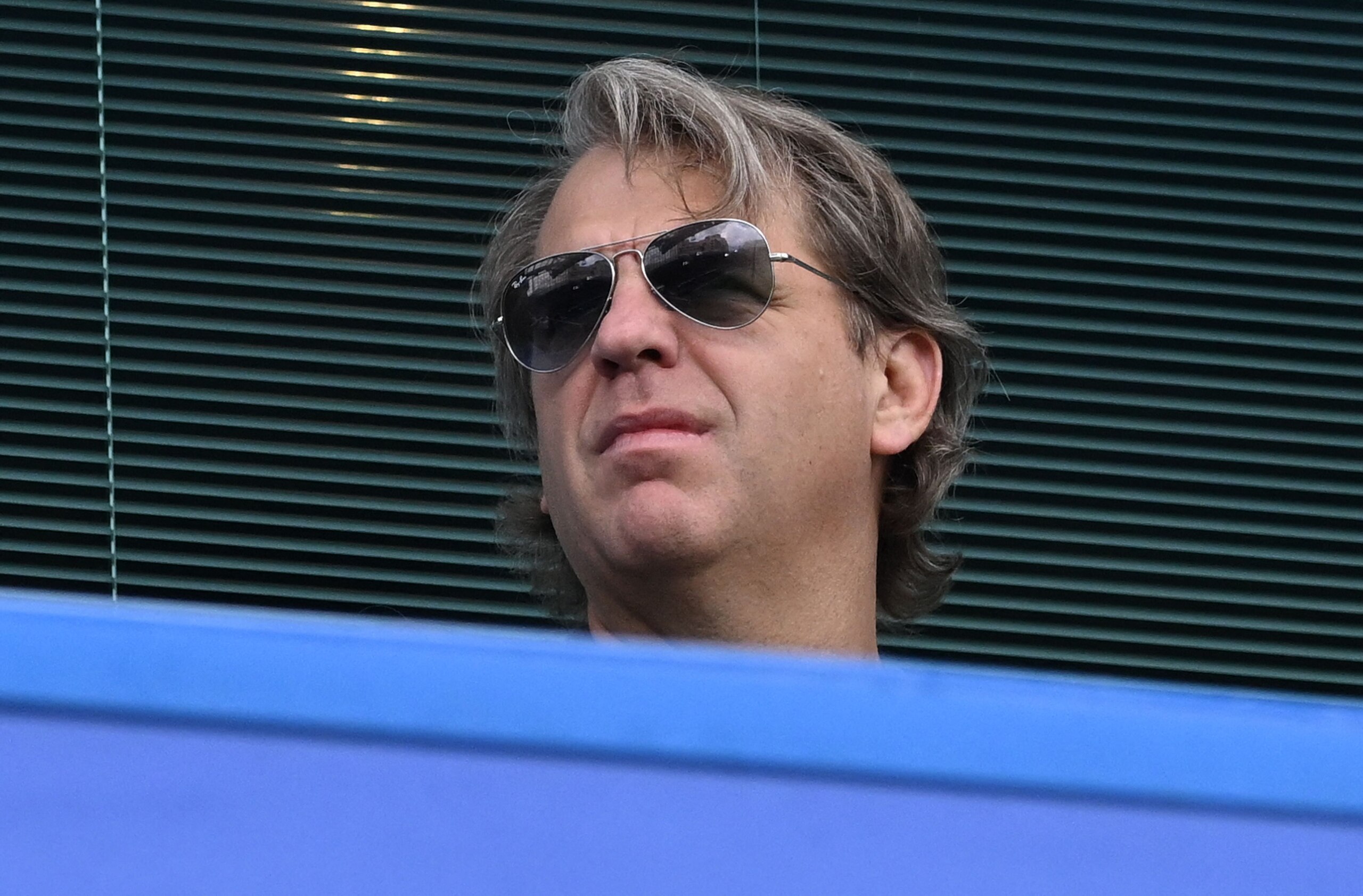 Chelsea's new owner Todd Boehly watches during the English Premier League football match between Chelsea and Wolverhampton Wanderers at Stamford Bridge in London on May 7, 2022. - RESTRICTED TO EDITORIAL USE. No use with unauthorized audio, video, data, fixture lists, club/league logos or 'live' services. Online in-match use limited to 120 images. An additional 40 images may be used in extra time. No video emulation. Social media in-match use limited to 120 images. An additional 40 images may be used in extra time. No use in betting publications, games or single club/league/player publications. (Photo by JUSTIN TALLIS / AFP) / RESTRICTED TO EDITORIAL USE. No use with unauthorized audio, video, data, fixture lists, club/league logos or 'live' services. Online in-match use limited to 120 images. An additional 40 images may be used in extra time. No video emulation. Social media in-match use limited to 120 images. An additional 40 images may be used in extra time. No use in betting publications, games or single club/league/player publications. / RESTRICTED TO EDITORIAL USE. No use with unauthorized audio, video, data, fixture lists, club/league logos or 'live' services. Online in-match use limited to 120 images. An additional 40 images may be used in extra time. No video emulation. Social media in-match use limited to 120 images. An additional 40 images may be used in extra time. No use in betting publications, games or single club/league/player publications. (Photo by JUSTIN TALLIS/AFP via Getty Images)