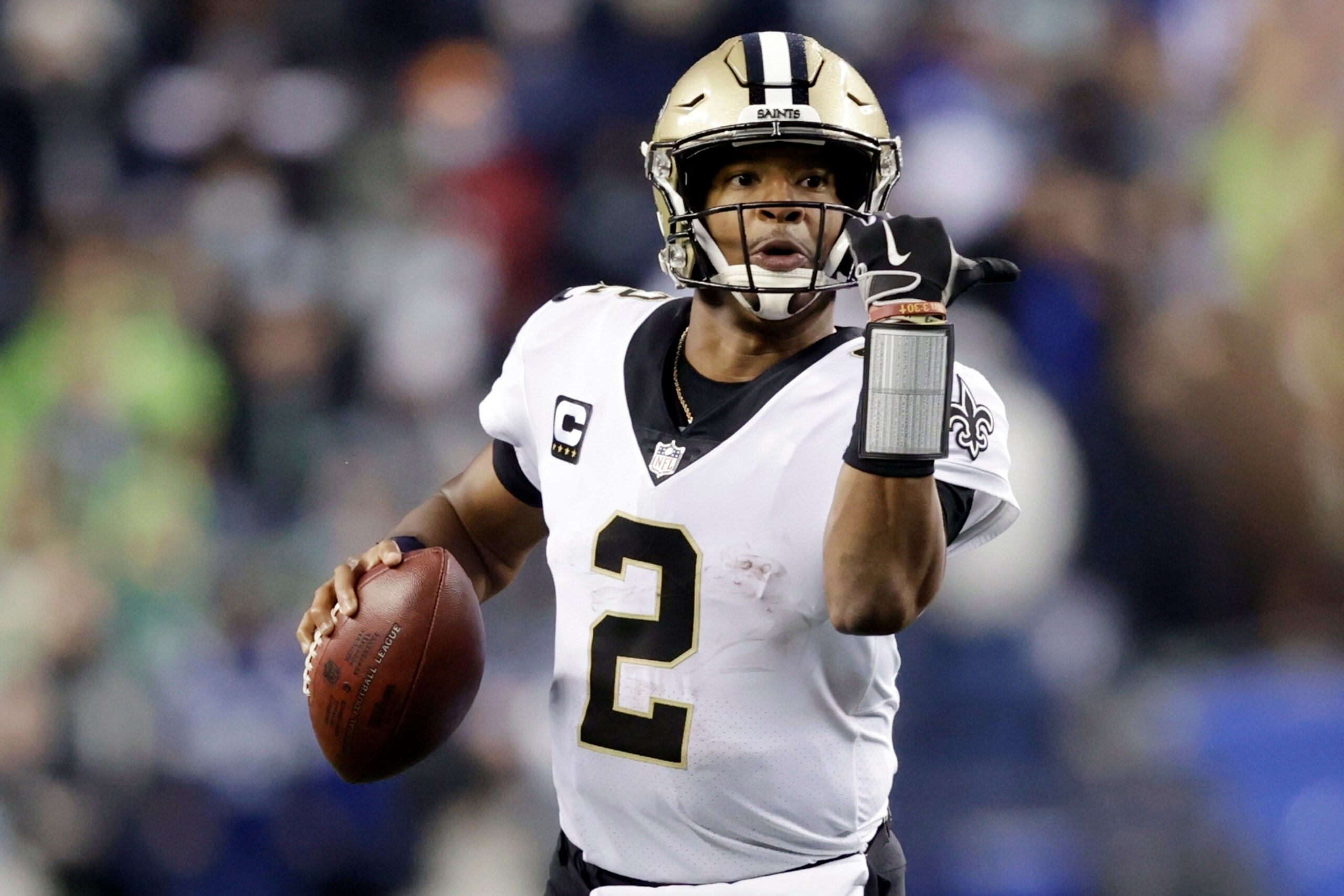 New Orleans Saints quarterback Jameis Winston looks for a receiver during the first half of an NFL football game against the Seattle Seahawks on Oct. 25, 2021, in Seattle. Winston arguably tops the list of free agents because New Orleans appeared on track to make the playoffs to start the post-Drew Brees era when Winston's season ended with a torn anterior cruciate ligament in his left knee on Oct. 31. (AP Photo/John Froschauer, File)
