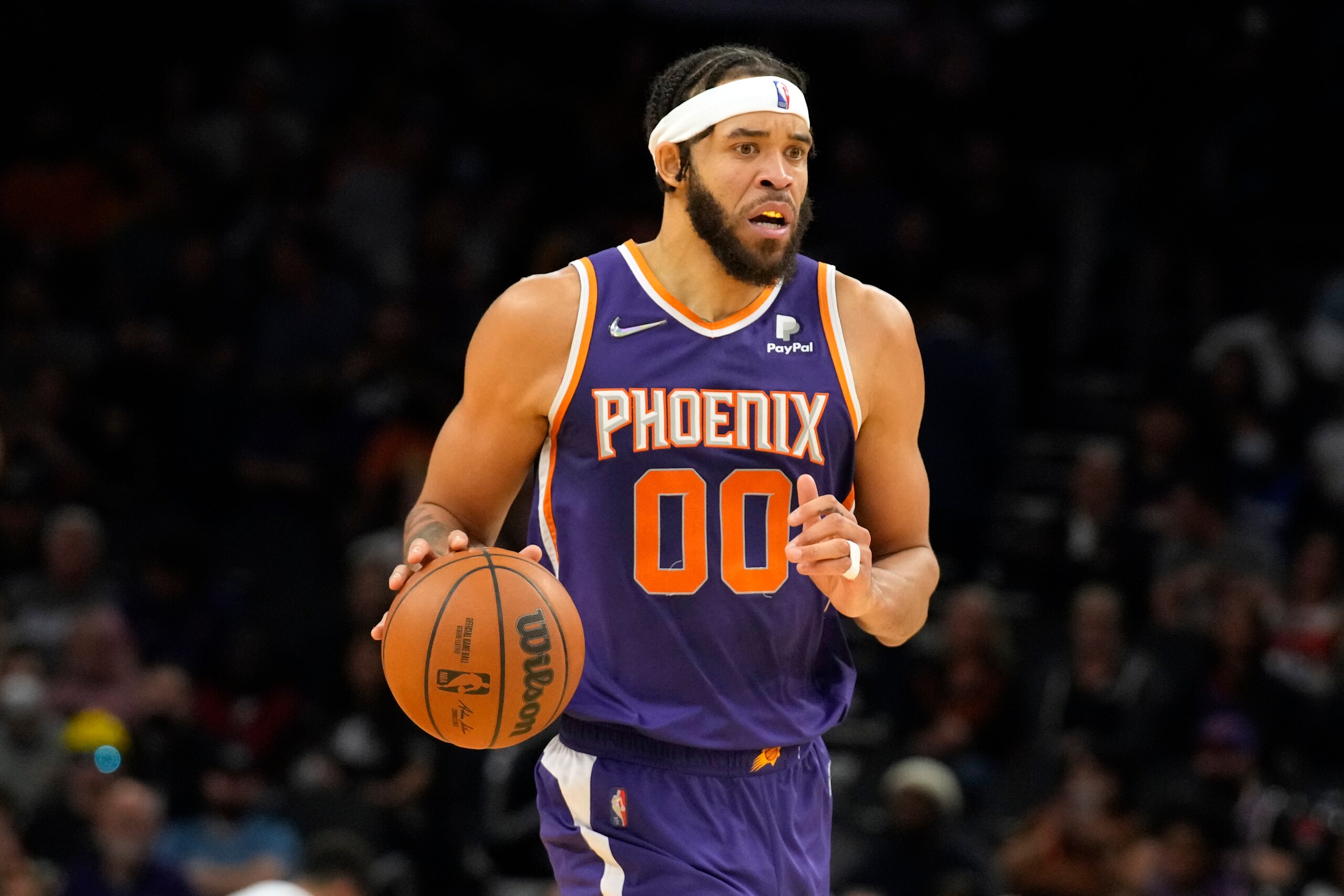 Phoenix Suns center JaVale McGee (00) during the first half of an NBA basketball game against the Los Angeles Lakers, Tuesday, April 5, 2022, in Phoenix. (AP Photo/Rick Scuteri) Phoenix Suns center JaVale McGee (00) during the first half of an NBA basketball game against the Los Angeles Lakers, Tuesday, April 5, 2022, in Phoenix. (AP Photo/Rick Scuteri)