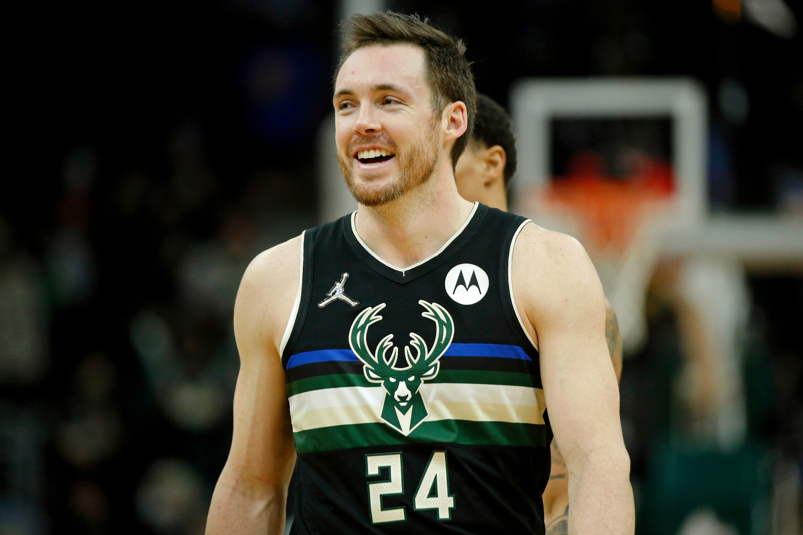 Milwaukee Bucks guard Pat Connaughton (24) reacts after a play against the Sacramento Kings during the second half of an NBA basketball game Saturday, Jan. 22, 2022, in Milwaukee. The Bucks won 133-127. (AP Photo/Jon Durr)