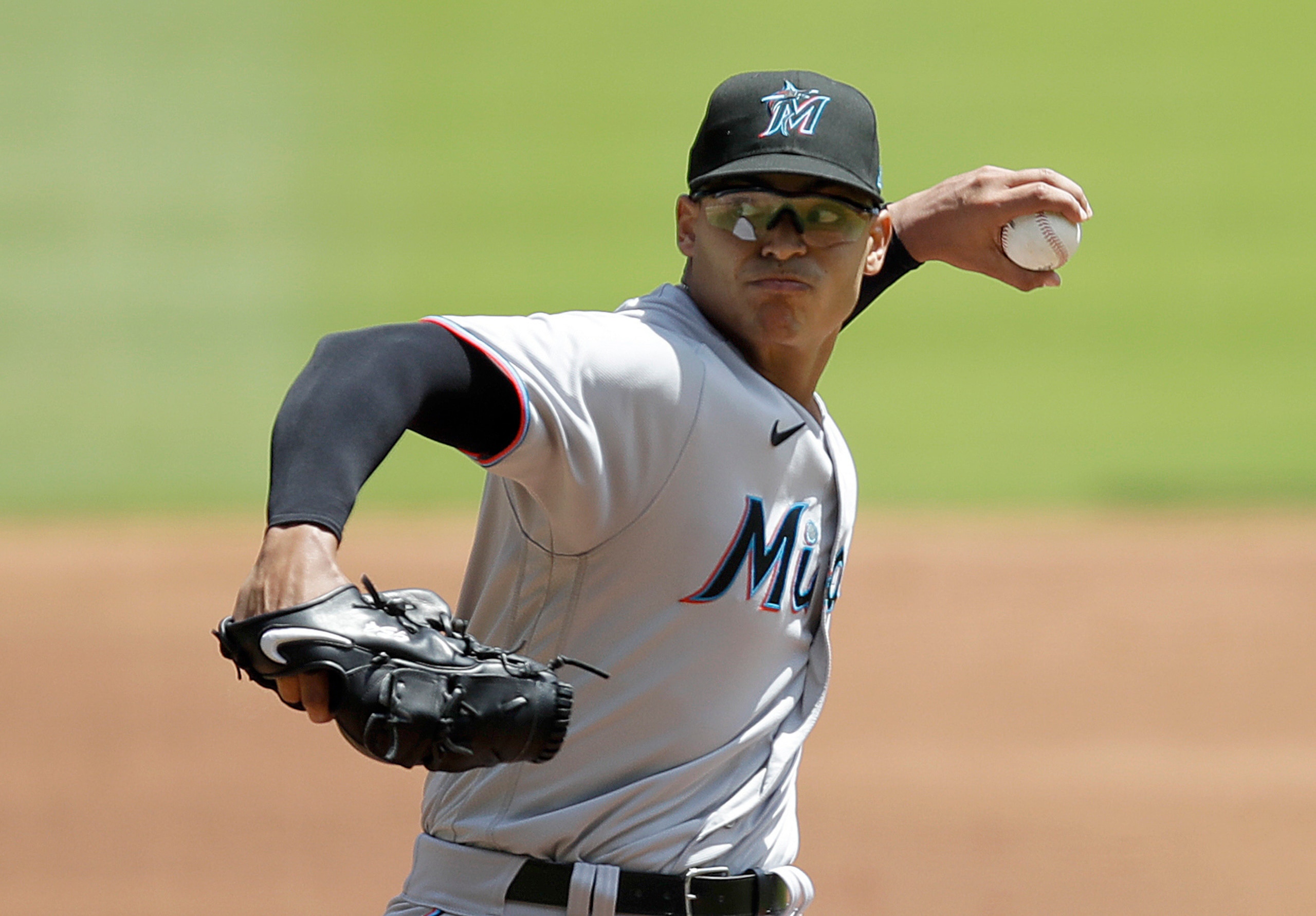 Miami Marlins pitcher Jesus Luzardo works against the Atlanta Braves in the first inning of a baseball game Sunday, April 24, 2022, in Atlanta. (AP Photo/Ben Margot)