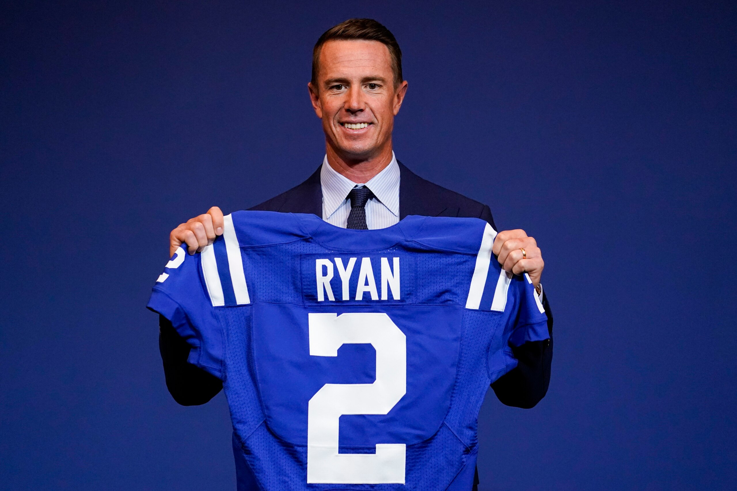 Indianapolis Colts quarterback Matt Ryan holds his new jersey following a press conference at the NFL team's practice facility in Indianapolis, Tuesday, March 22, 2022. (AP Photo/Michael Conroy) Indianapolis Colts quarterback Matt Ryan holds his new jersey following a press conference at the NFL team's practice facility in Indianapolis, Tuesday, March 22, 2022. (AP Photo/Michael Conroy)