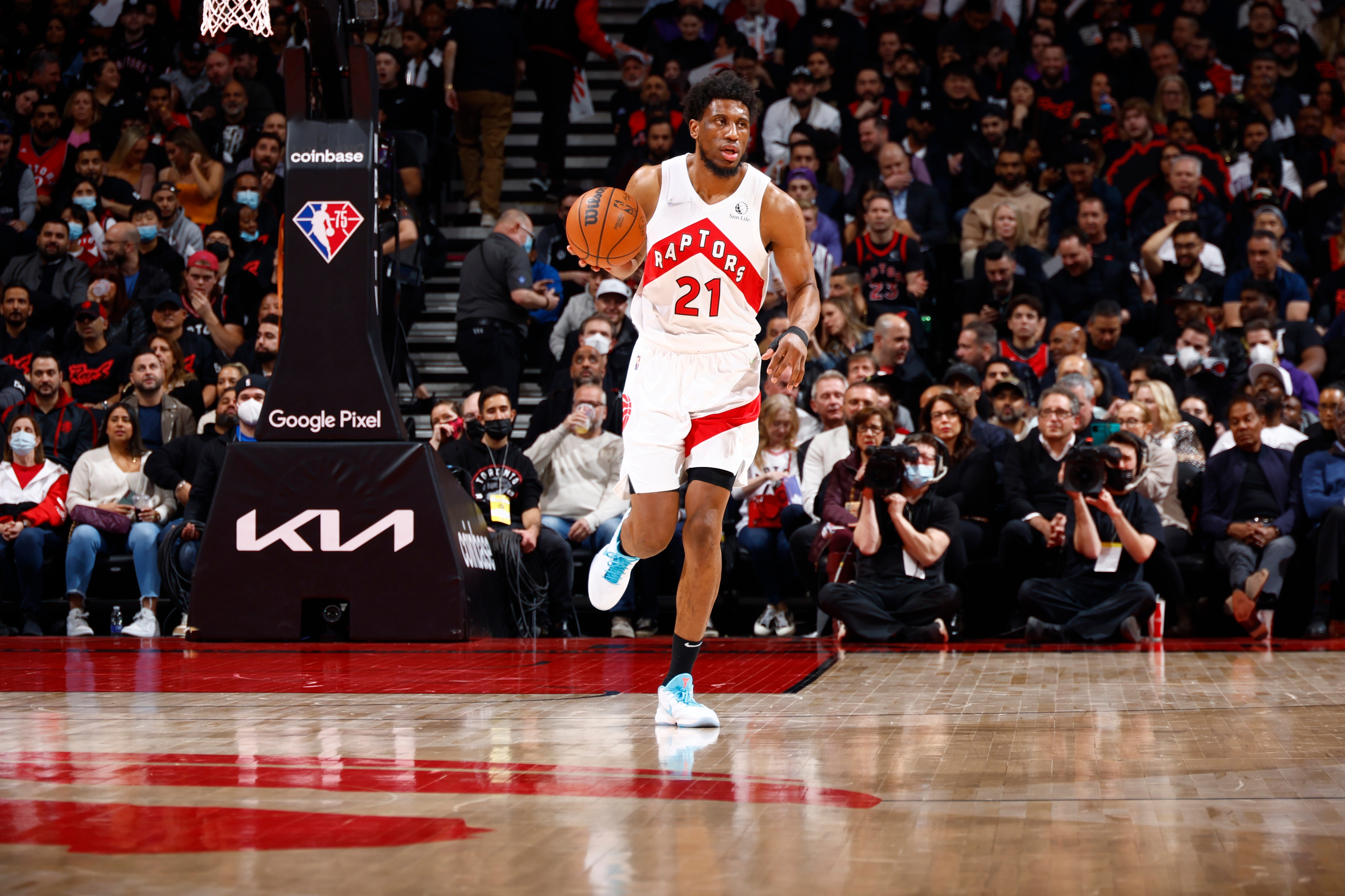 TORONTO, CANADA - APRIL 28: Thaddeus Young #21 of the Toronto Raptors dribbles the ball during the game against the Philadelphia 76ers during Round 1 Game 6 of the 2022 NBA Playoffs on April 28, 2022 at the Scotiabank Arena in Toronto, Ontario, Canada.  NOTE TO USER: User expressly acknowledges and agrees that, by downloading and or using this Photograph, user is consenting to the terms and conditions of the Getty Images License Agreement.  Mandatory Copyright Notice: Copyright 2022 NBAE (Photo by Vaughn Ridley/NBAE via Getty Images)
