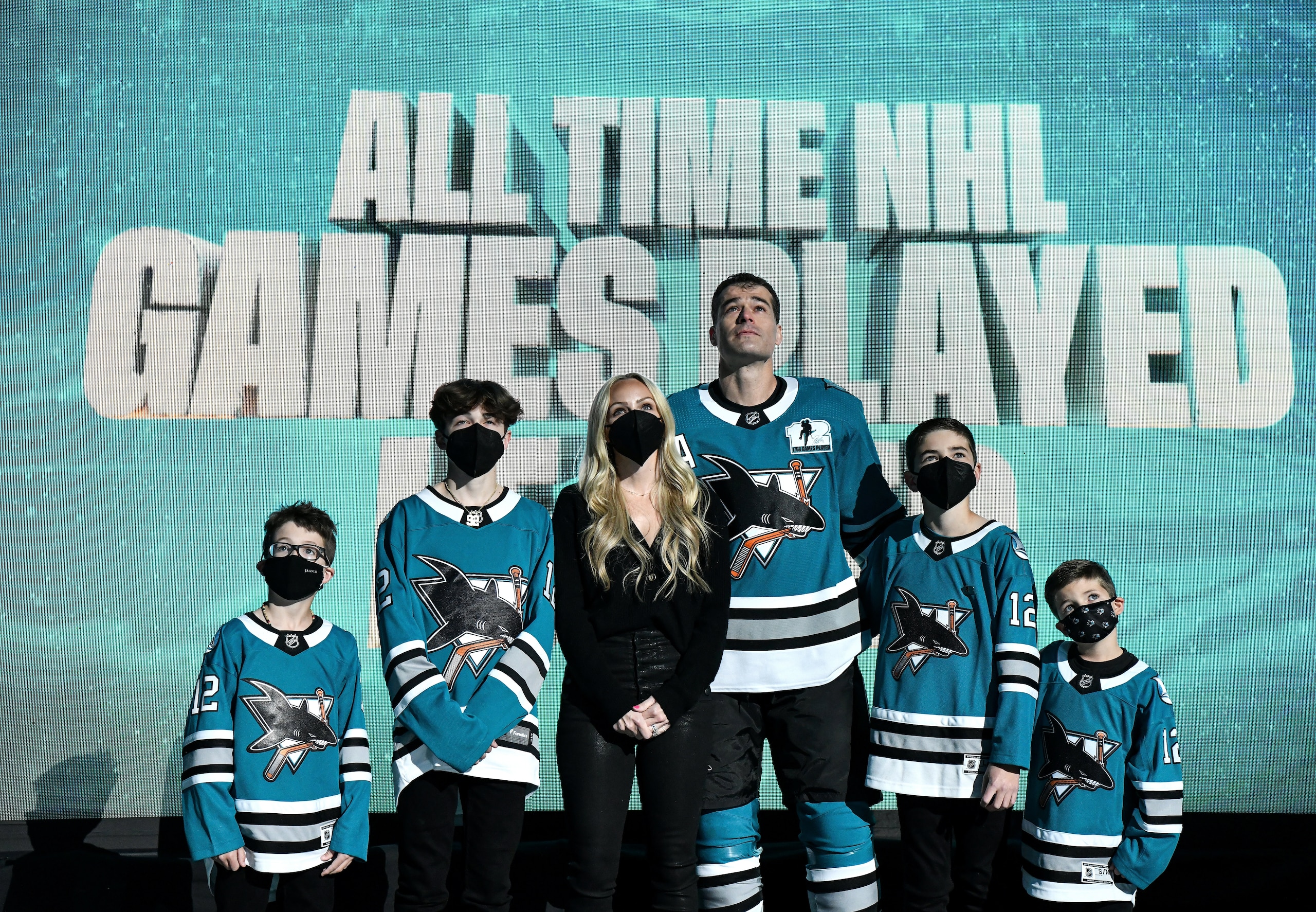 SAN JOSE, CA - APRIL 24: Patrick Marleau #12 of the San Jose Sharks and his family look up at the video board as he is honored for having passed Gordie Howe on the NHLs all-time games played list before the game against the Minnesota Wild at SAP Center on April 24, 2021 in San Jose, California. (Photo by Brandon Magnus/NHLI via Getty Images) SAN JOSE, CA - APRIL 24: Patrick Marleau #12 of the San Jose Sharks and his family look up at the video board as he is honored for having passed Gordie Howe on the NHLs all-time games played list before the game against the Minnesota Wild at SAP Center on April 24, 2021 in San Jose, California. (Photo by Brandon Magnus/NHLI via Getty Images)