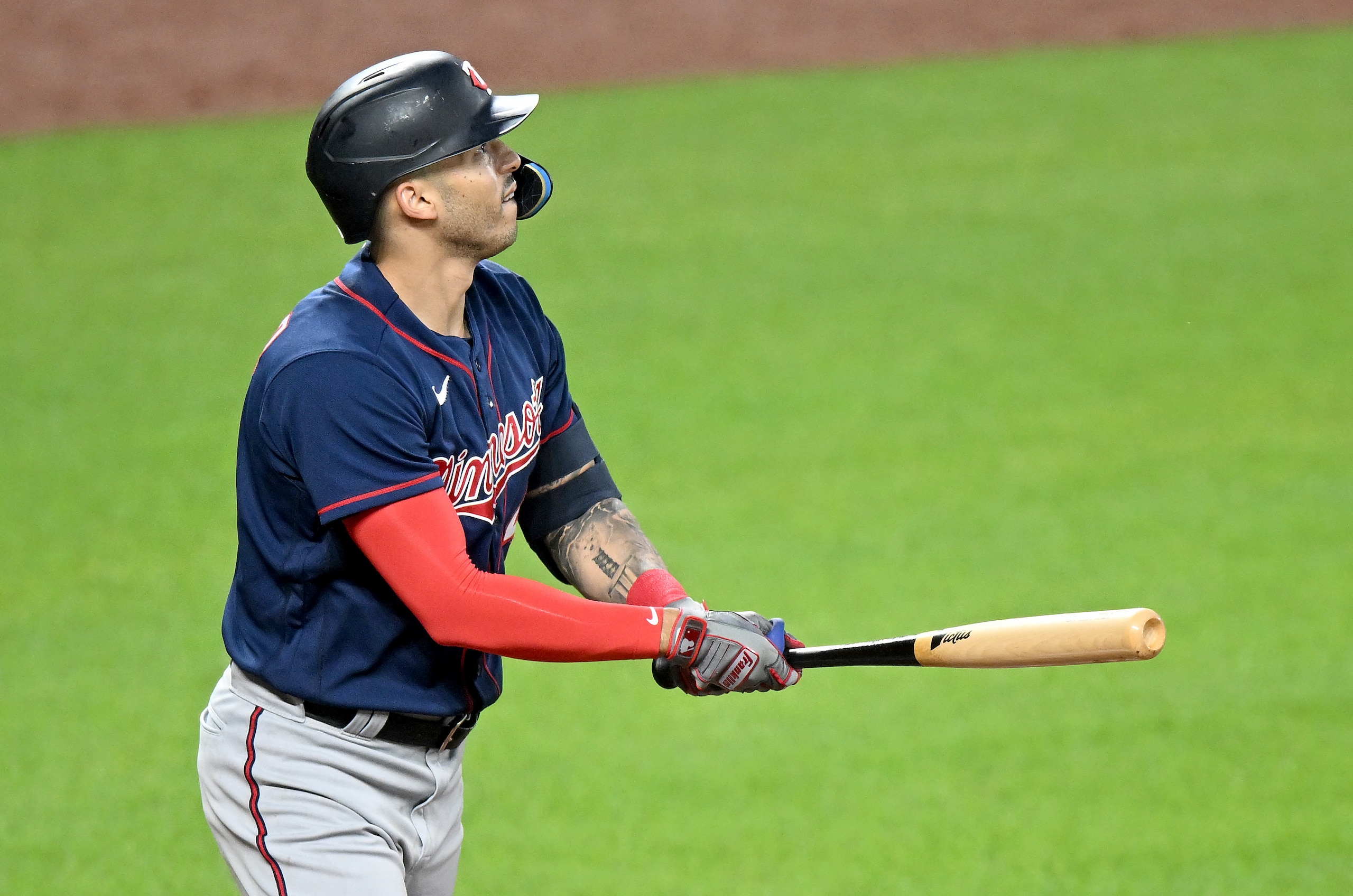 BALTIMORE, MARYLAND - MAY 04: Carlos Correa #4 of the Minnesota Twins hits a home run against the Baltimore Orioles at Oriole Park at Camden Yards on May 04, 2022 in Baltimore, Maryland. (Photo by G Fiume/Getty Images)