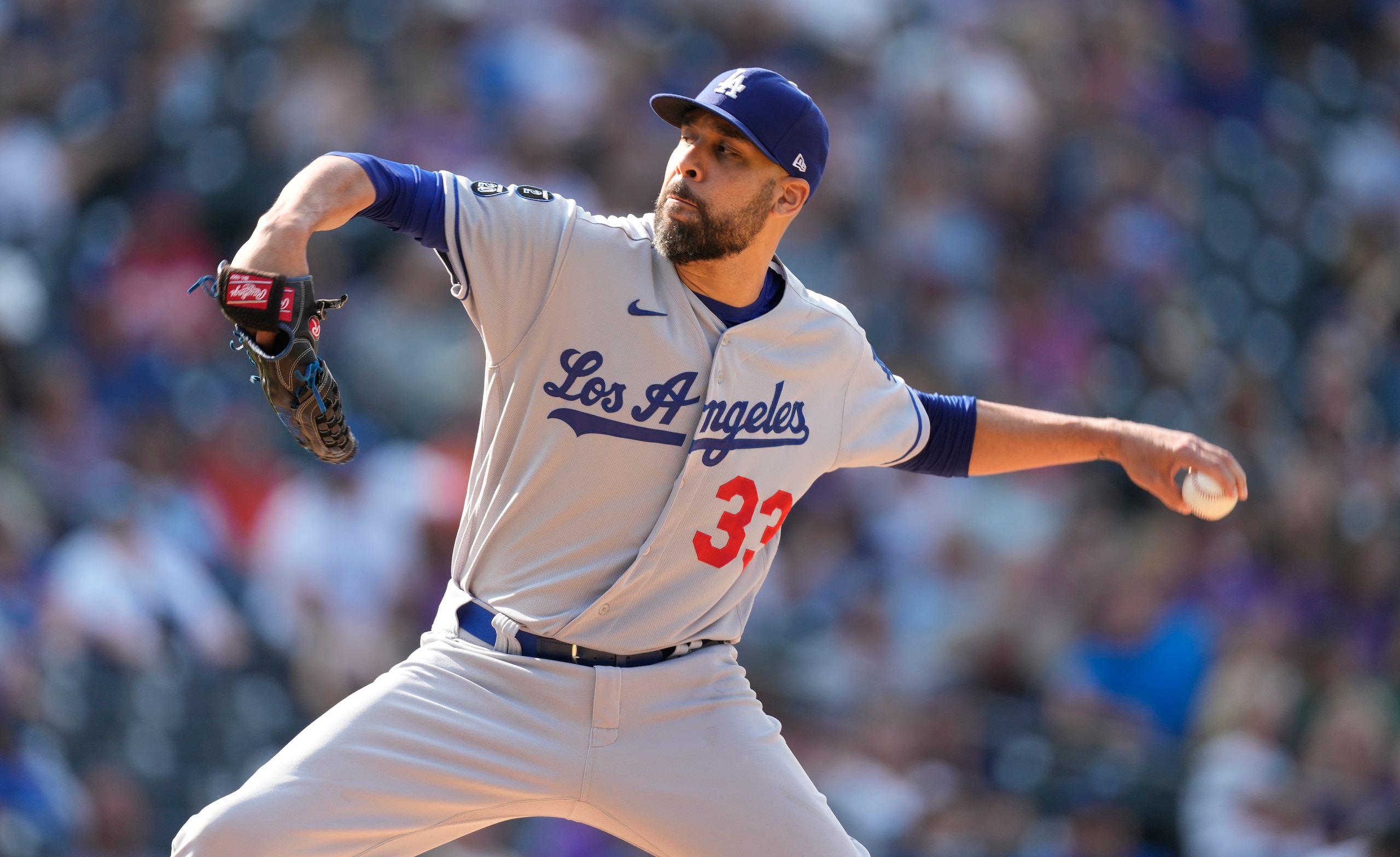 Los Angeles Dodgers relief pitcher David Price works against the Colorado Rockies in the seventh inning of a baseball game Thursday, Sept. 23, 2021, in Denver. (AP Photo/David Zalubowski)