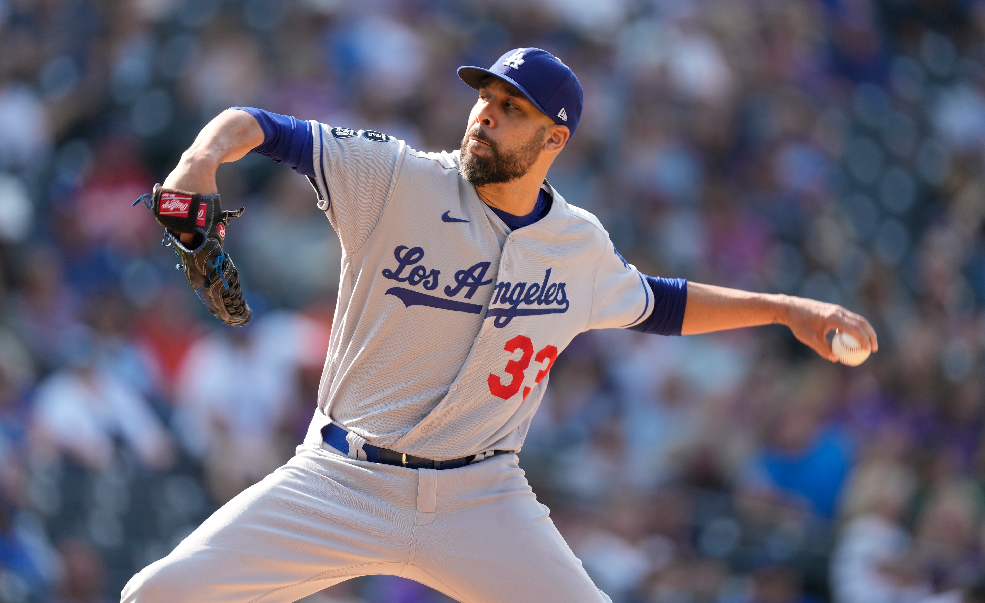 Los Angeles Dodgers relief pitcher David Price works against the Colorado Rockies in the seventh inning of a baseball game Thursday, Sept. 23, 2021, in Denver. (AP Photo/David Zalubowski)