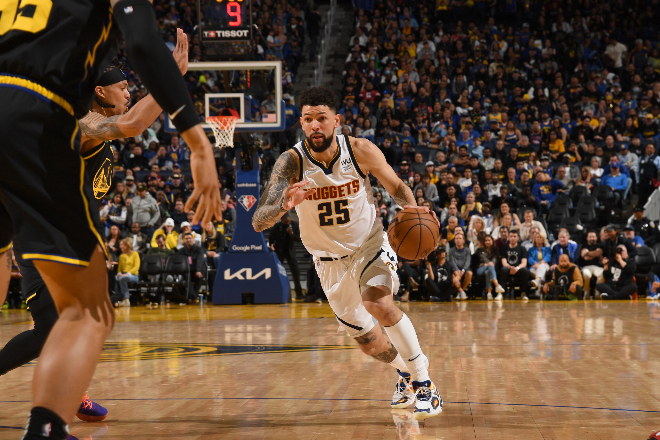 SAN FRANCISCO, CA - APRIL 16: Austin Rivers #25 of the Denver Nuggets drives to the basket against the Golden State Warriors during Round 1 Game 1 of the 2022 NBA Playoffs on APRIL 16, 2022 at Chase Center in San Francisco, California. NOTE TO USER: User expressly acknowledges and agrees that, by downloading and or using this photograph, user is consenting to the terms and conditions of Getty Images License Agreement. Mandatory Copyright Notice: Copyright 2022 NBAE (Photo by Noah Graham/NBAE via Getty Images)