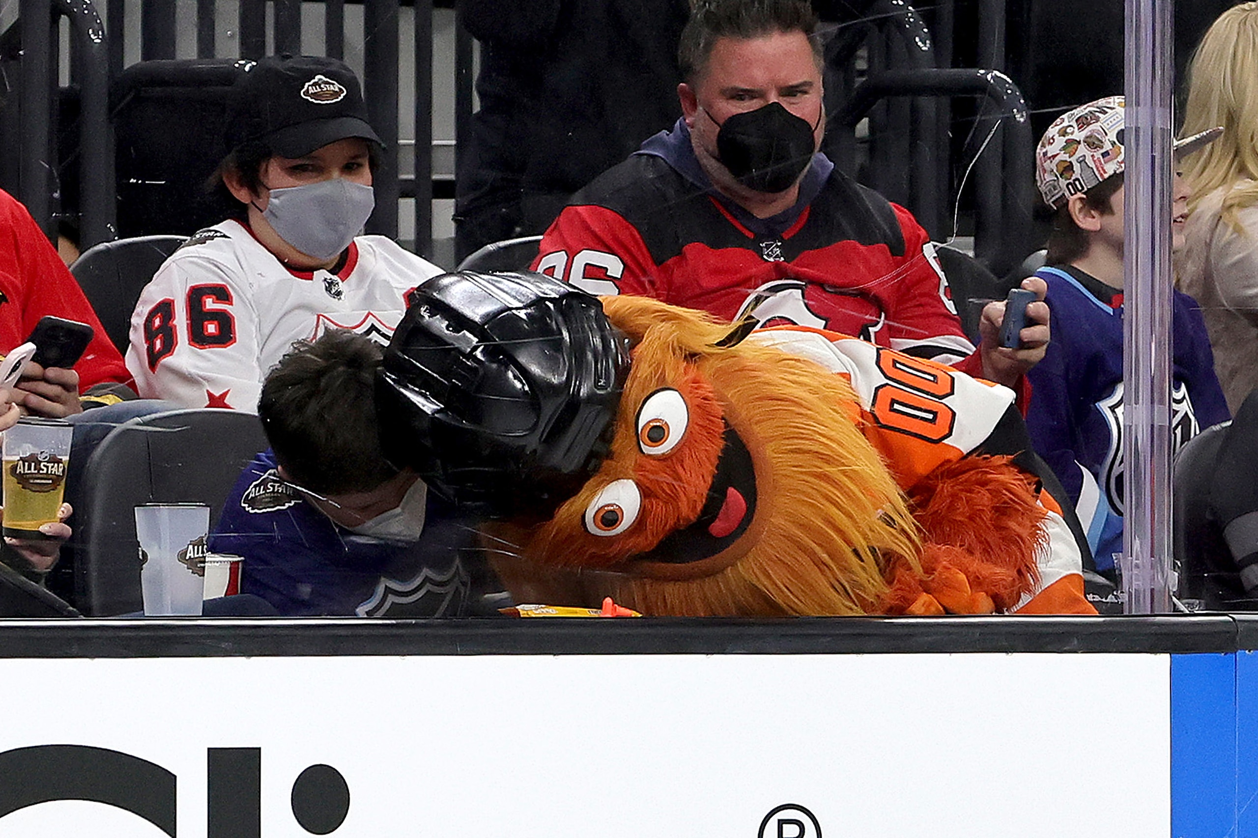 LAS VEGAS, NEVADA - FEBRUARY 05: The Philadelphia Flyers mascot Gritty interacts with a fan during the game between the Metropolitan Division and the Central Division during the 2022 Honda NHL All-Star Game at T-Mobile Arena on February 05, 2022 in Las Vegas, Nevada. (Photo by Ethan Miller/Getty Images) LAS VEGAS, NEVADA - FEBRUARY 05: The Philadelphia Flyers mascot Gritty interacts with a fan during the game between the Metropolitan Division and the Central Division during the 2022 Honda NHL All-Star Game at T-Mobile Arena on February 05, 2022 in Las Vegas, Nevada. (Photo by Ethan Miller/Getty Images)