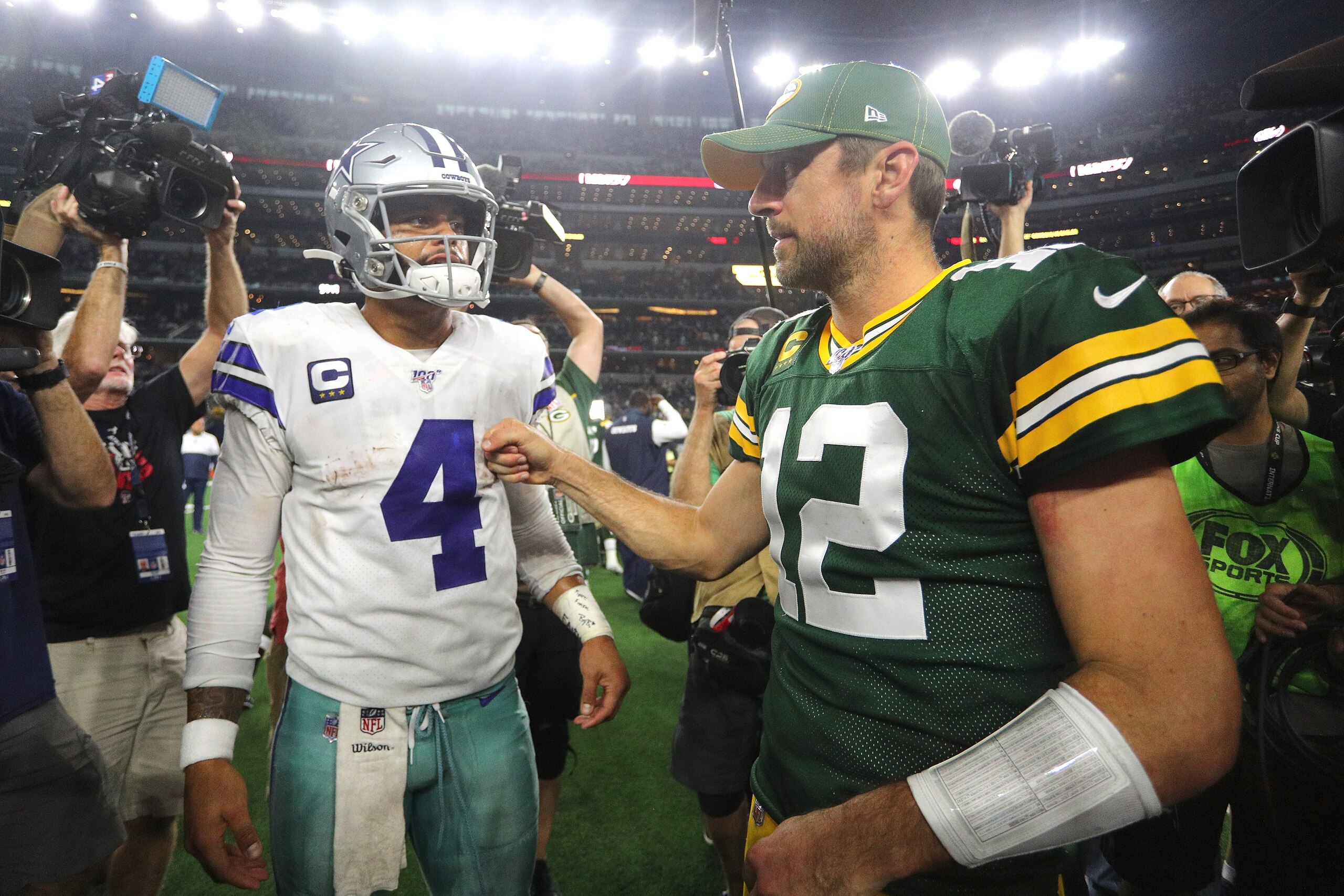 ARLINGTON, TEXAS - OCTOBER 06: Dak Prescott #4 of the Dallas Cowboys greets Aaron Rodgers #12 of the Green Bay Packers after the Packers' 34-24 win at AT&T Stadium on October 06, 2019 in Arlington, Texas. (Photo by Richard Rodriguez/Getty Images)