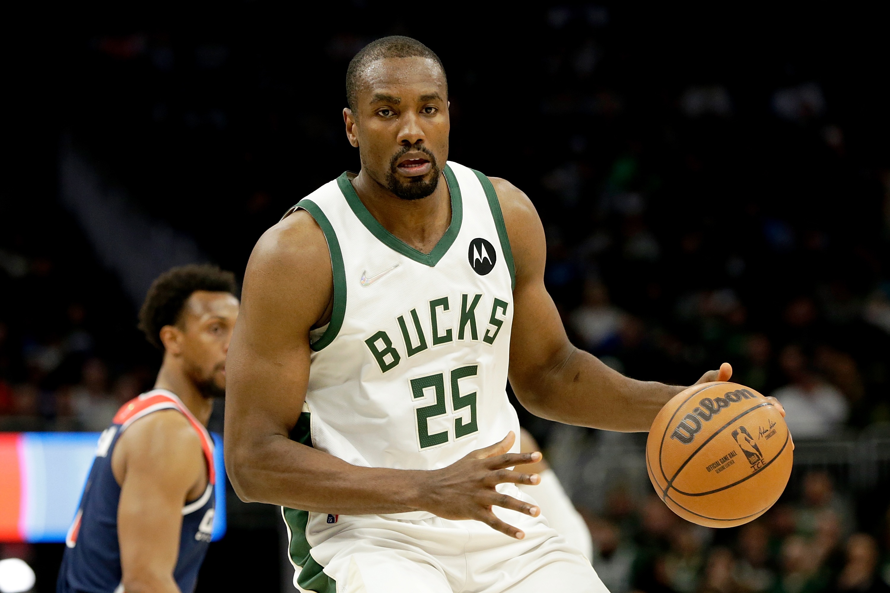 MILWAUKEE, WISCONSIN - MARCH 24: Serge Ibaka #25 of the Milwaukee Bucks looks to pass during the second half of the game against the Washington Wizards at Fiserv Forum on March 24, 2022 in Milwaukee, Wisconsin. NOTE TO USER: User expressly acknowledges and agrees that, by downloading and or using this photograph, User is consenting to the terms and conditions of the Getty Images License Agreement. (Photo by John Fisher/Getty Images)