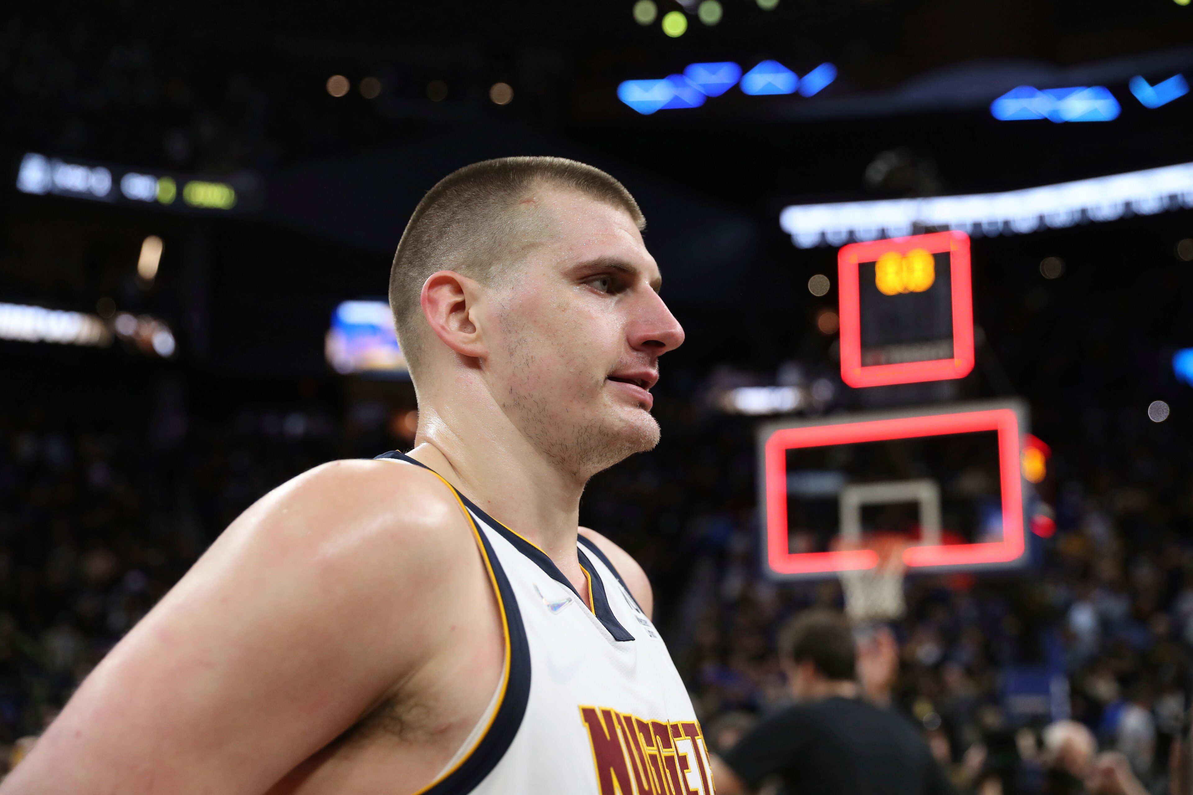 Denver Nuggets center Nikola Jokic walks off the court after the team's loss in Game 5 of an NBA basketball first-round playoff series against the Golden State Warriors in San Francisco, Wednesday, April 27, 2022. The Warriors won the series. (AP Photo/Jed Jacobsohn) Denver Nuggets center Nikola Jokic walks off the court after the team's loss in Game 5 of an NBA basketball first-round playoff series against the Golden State Warriors in San Francisco, Wednesday, April 27, 2022. The Warriors won the series. (AP Photo/Jed Jacobsohn)