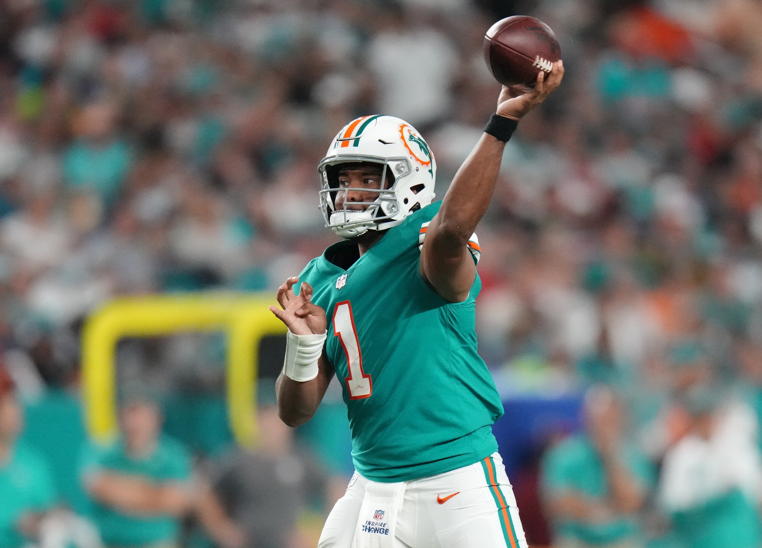 MIAMI GARDENS, FLORIDA - JANUARY 09: Tua Tagovailoa #1 of the Miami Dolphins in action against the New England Patriots at Hard Rock Stadium on January 09, 2022 in Miami Gardens, Florida. (Photo by Mark Brown/Getty Images)