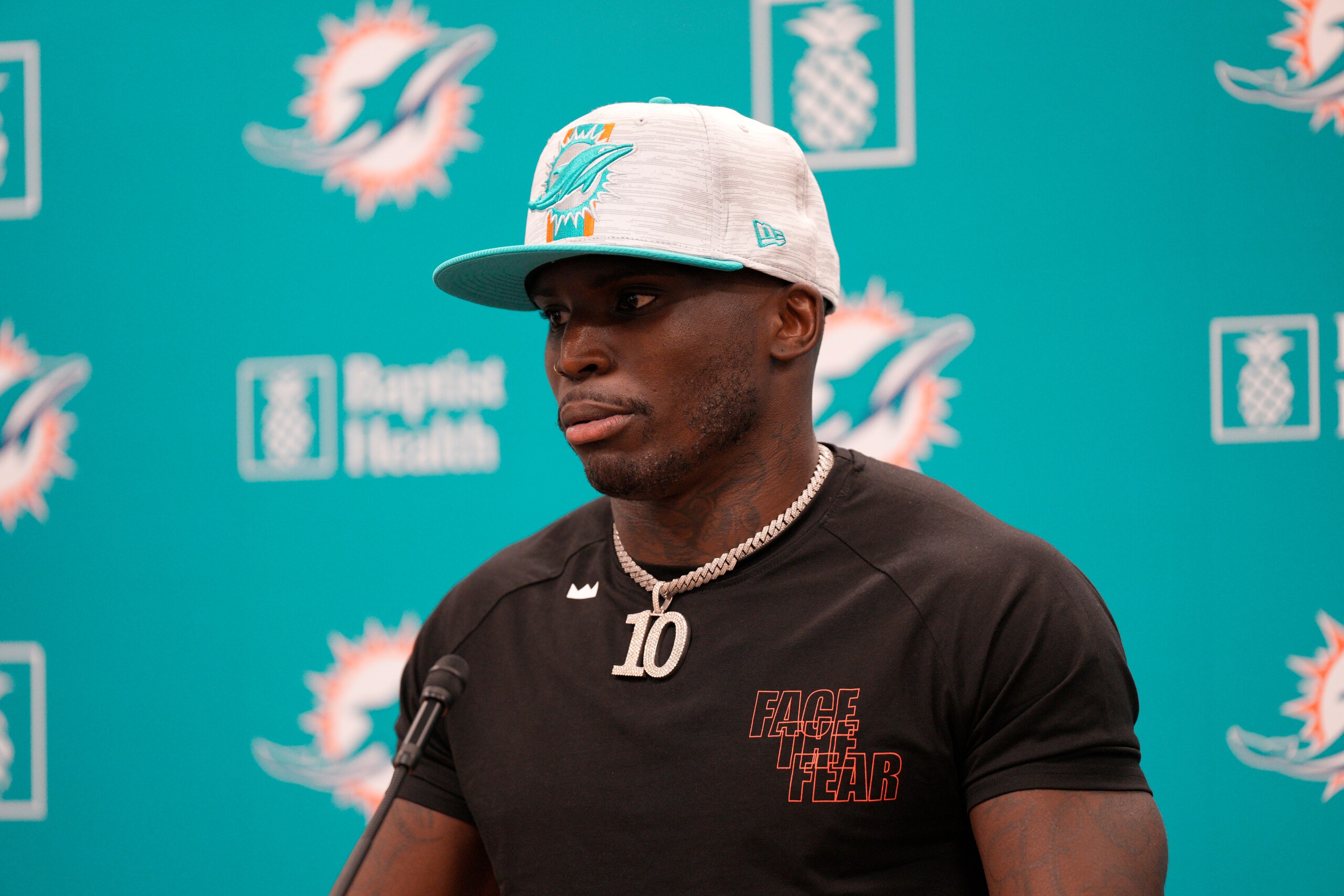 MIAMI GARDENS, FLORIDA - MARCH 24: Tyreek Hill speaks with the media after being introduced by the Miami Dolphins at Baptist Health Training Complex on March 24, 2022 in Miami Gardens, Florida. (Photo by Mark Brown/Getty Images)