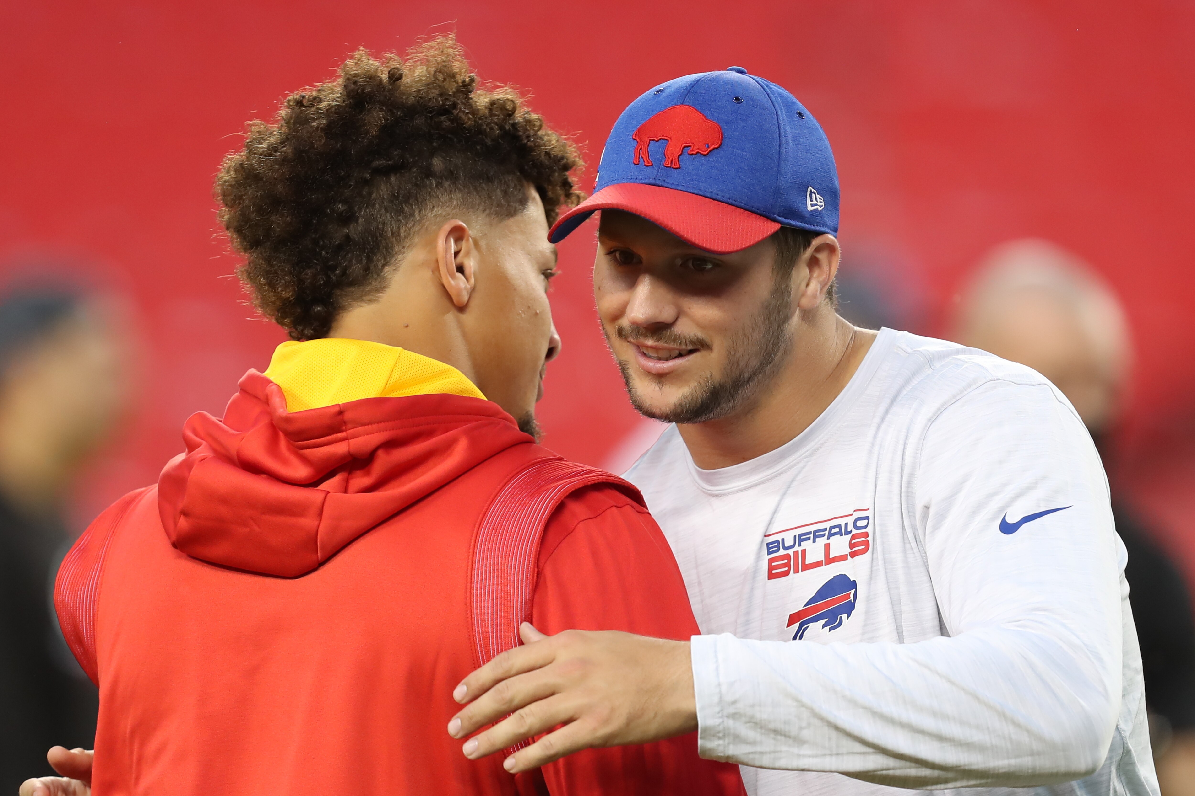 KANSAS CITY, MO - OCTOBER 10: Buffalo Bills quarterback Josh Allen (17) and Kansas City Chiefs quarterback Patrick Mahomes (15) hug before an NFL football game between the Buffalo Bills and Kansas City Chiefs on Oct 10, 2021 at GEHA Filed at Arrowhead Stadium in Kansas City, MO. (Photo by Scott Winters/Icon Sportswire via Getty Images)